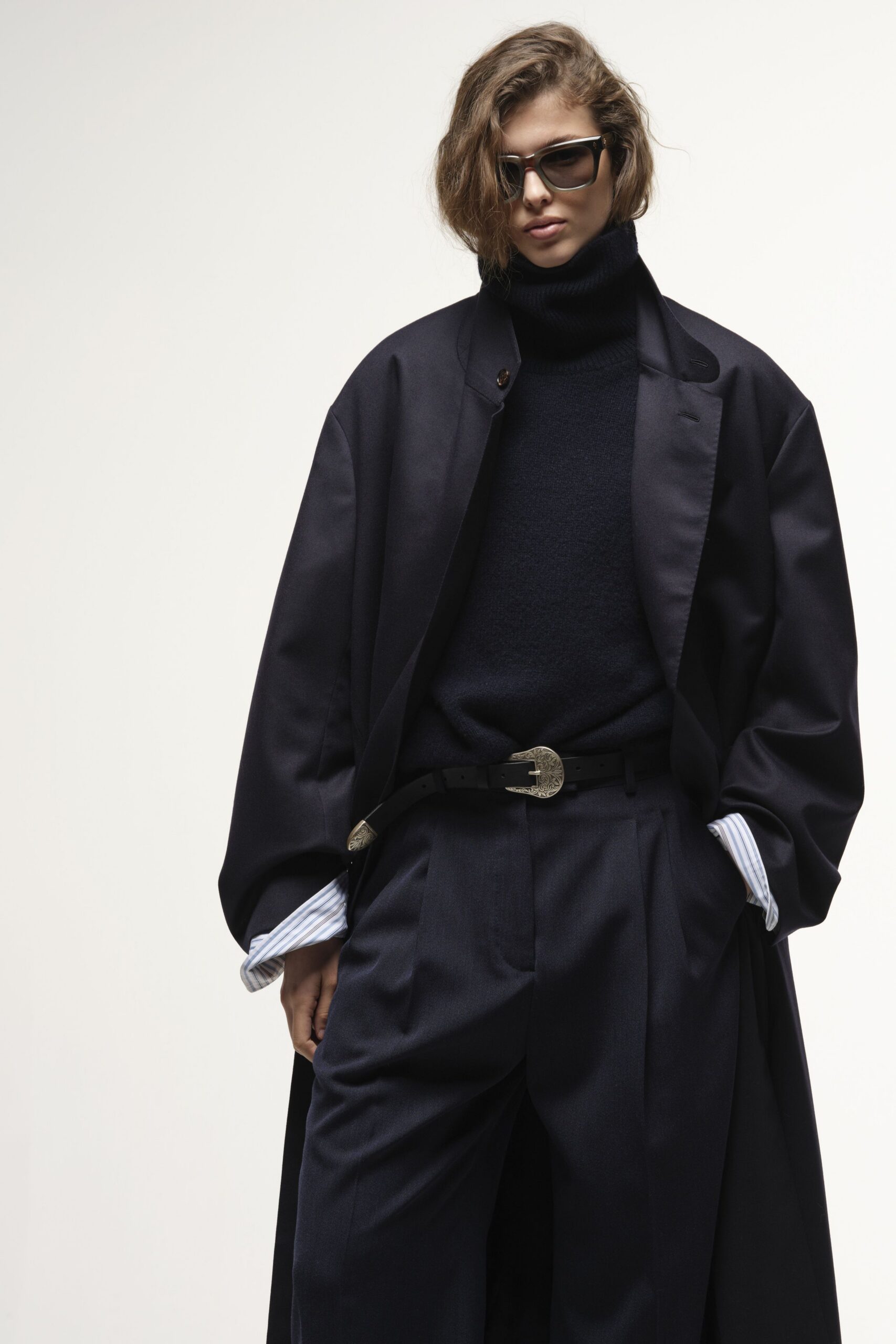 black wool coat and sweater