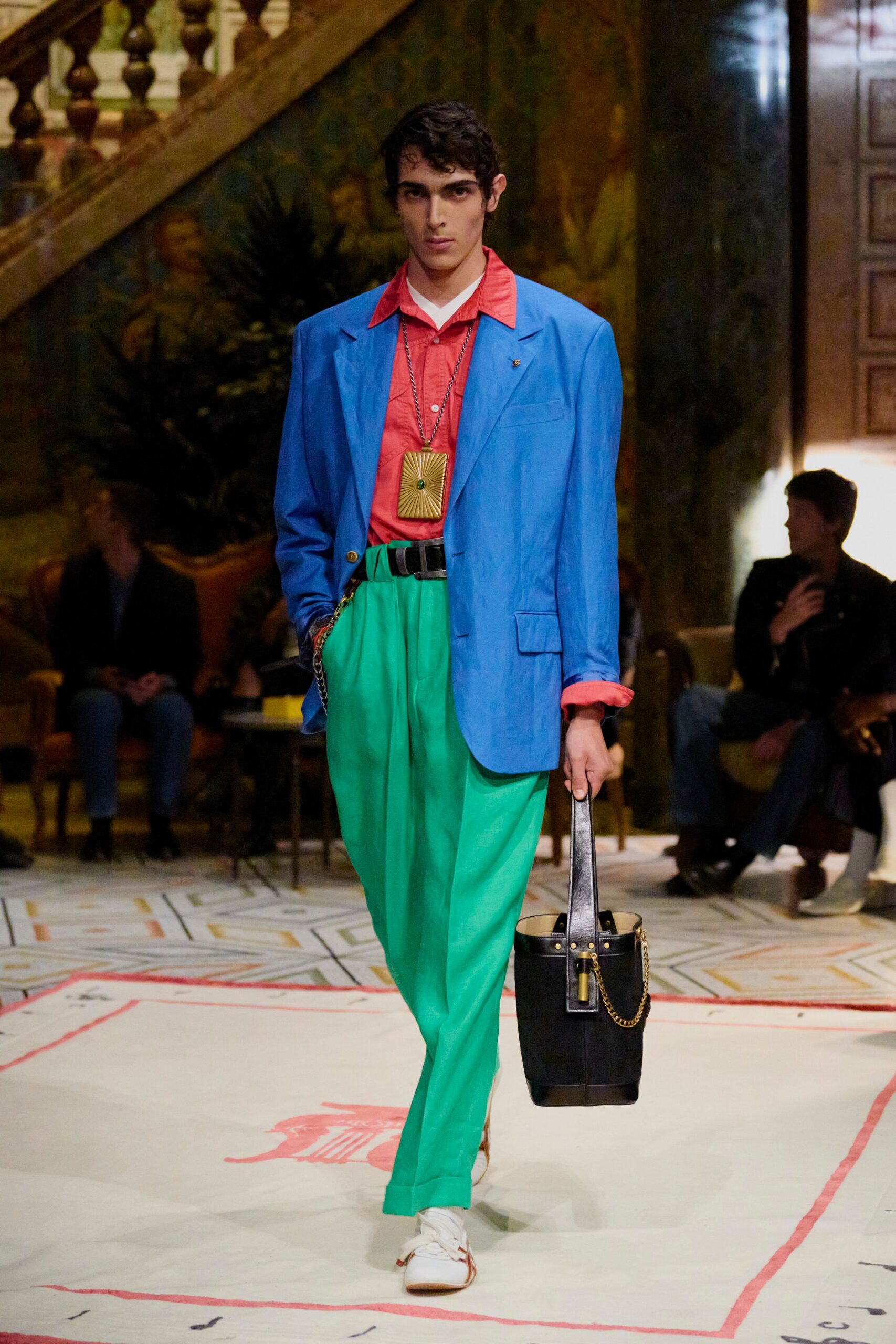 blue blazer red shirt green pants