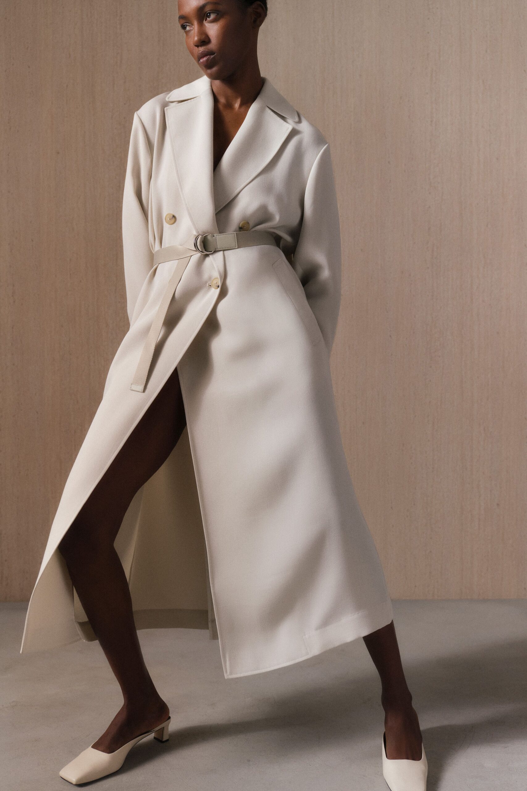beige cotton long-sleeve collared fitted belted maxi trench