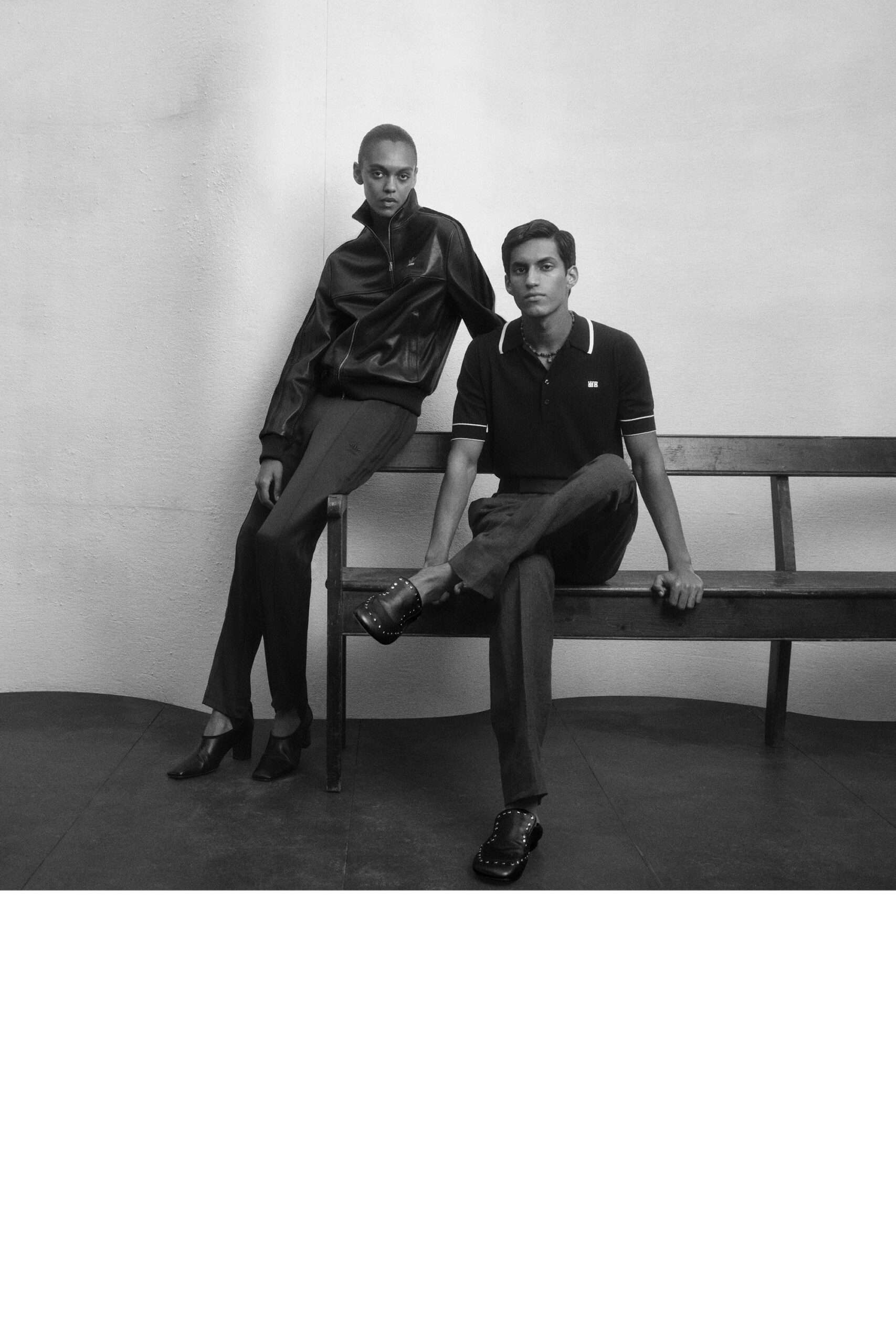 black leather long-sleeve collared fitted top