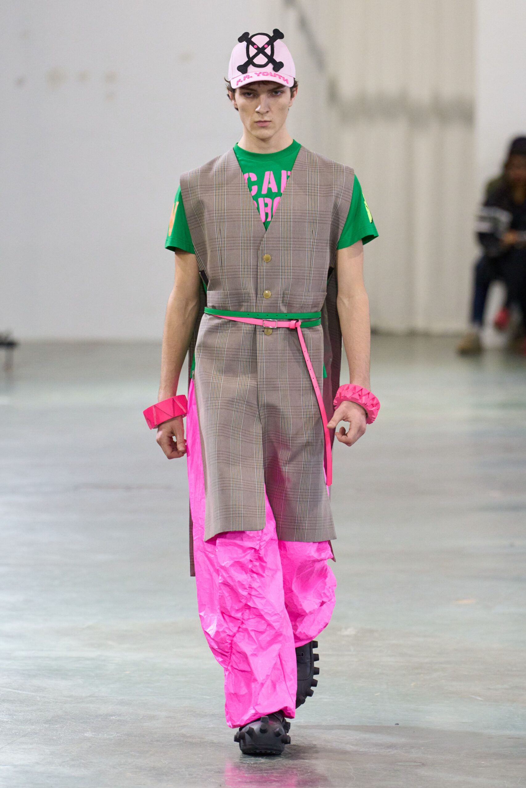 gray vest green t-shirt pink pants