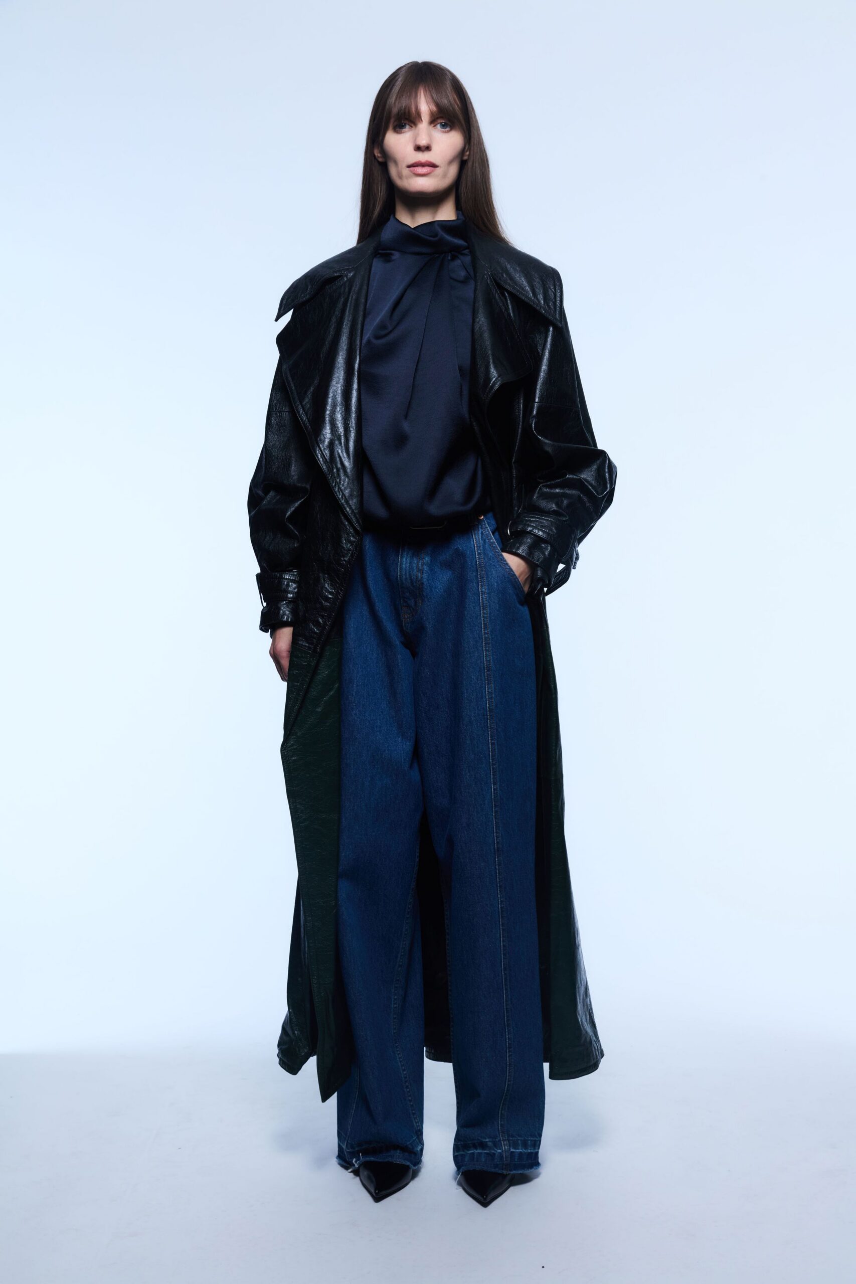 black leather long-sleeve collared relaxed zippered coat