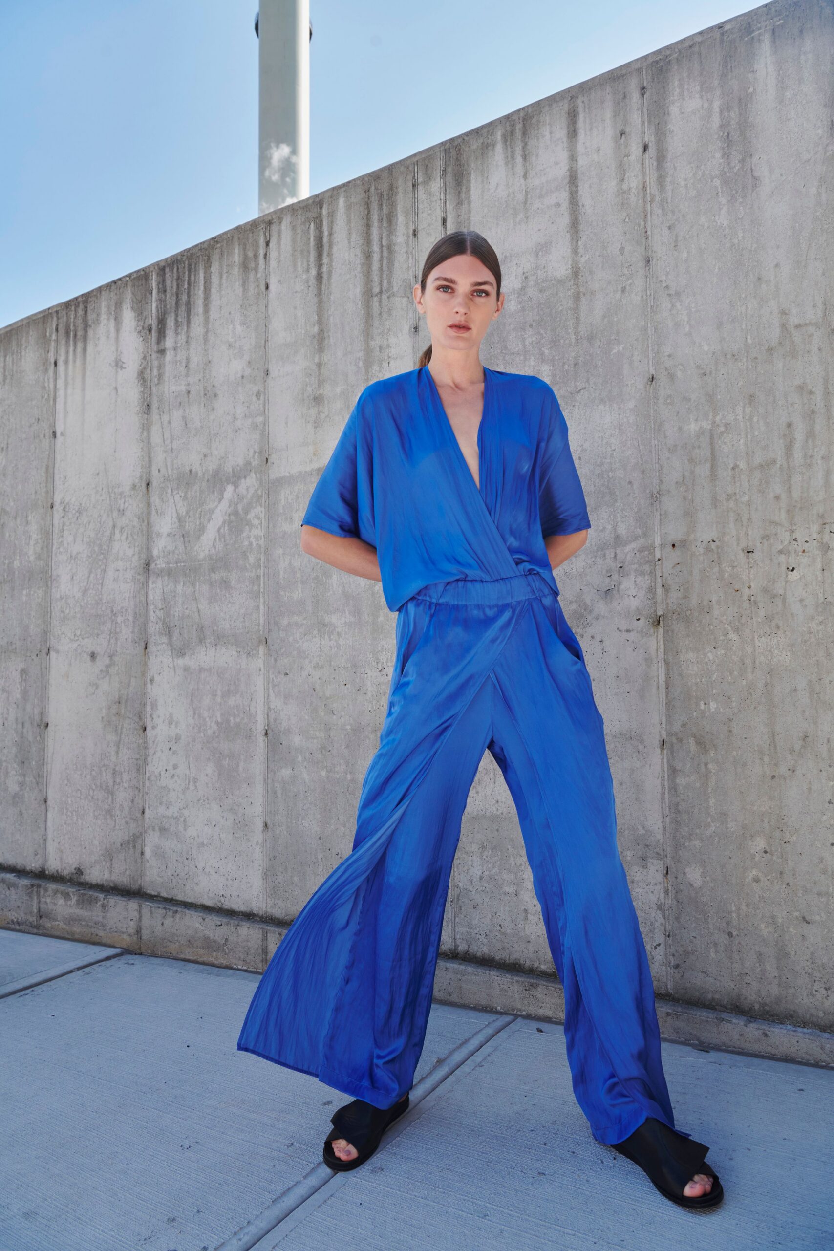 blue silk short-sleeve v-neck relaxed draped flowing jumpsuit