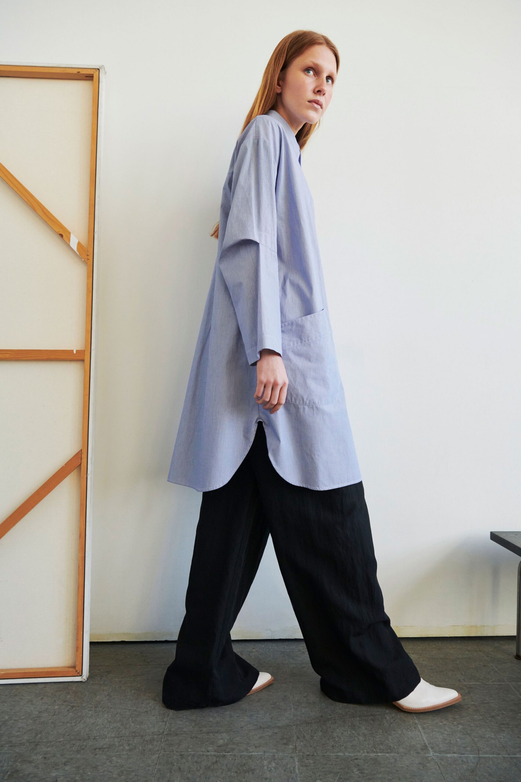 blue and white relaxed shirt with black wide-leg pants