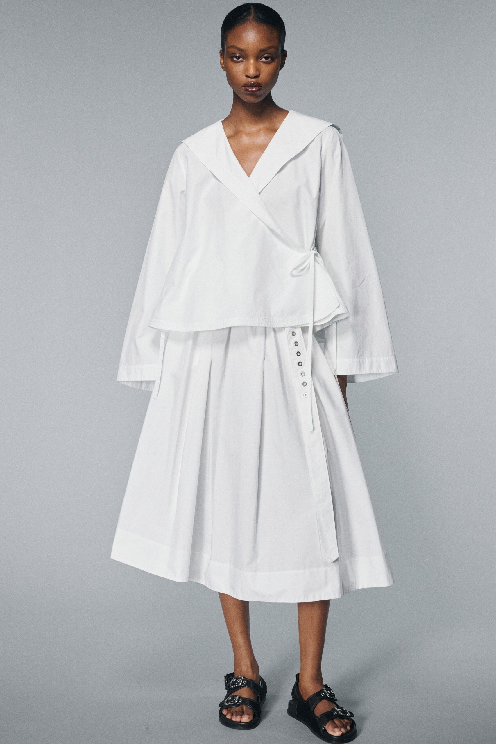 white cotton fitted high-waisted pleated buttoned midi skirt