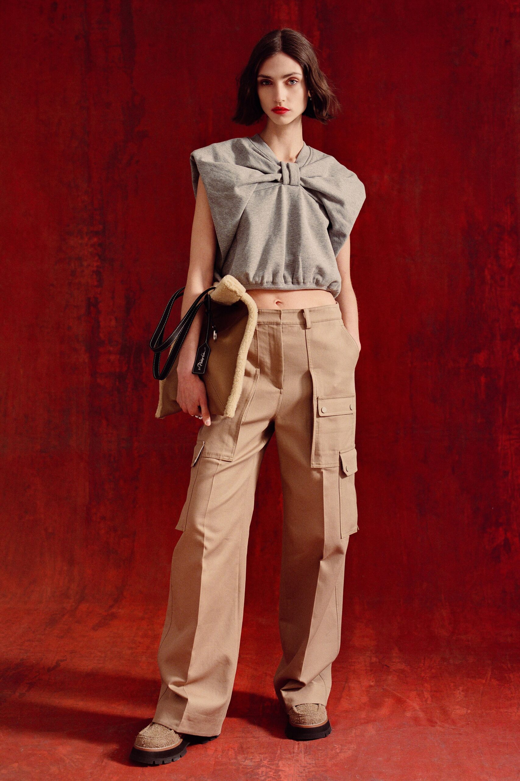 gray relaxed top with beige cargo pants