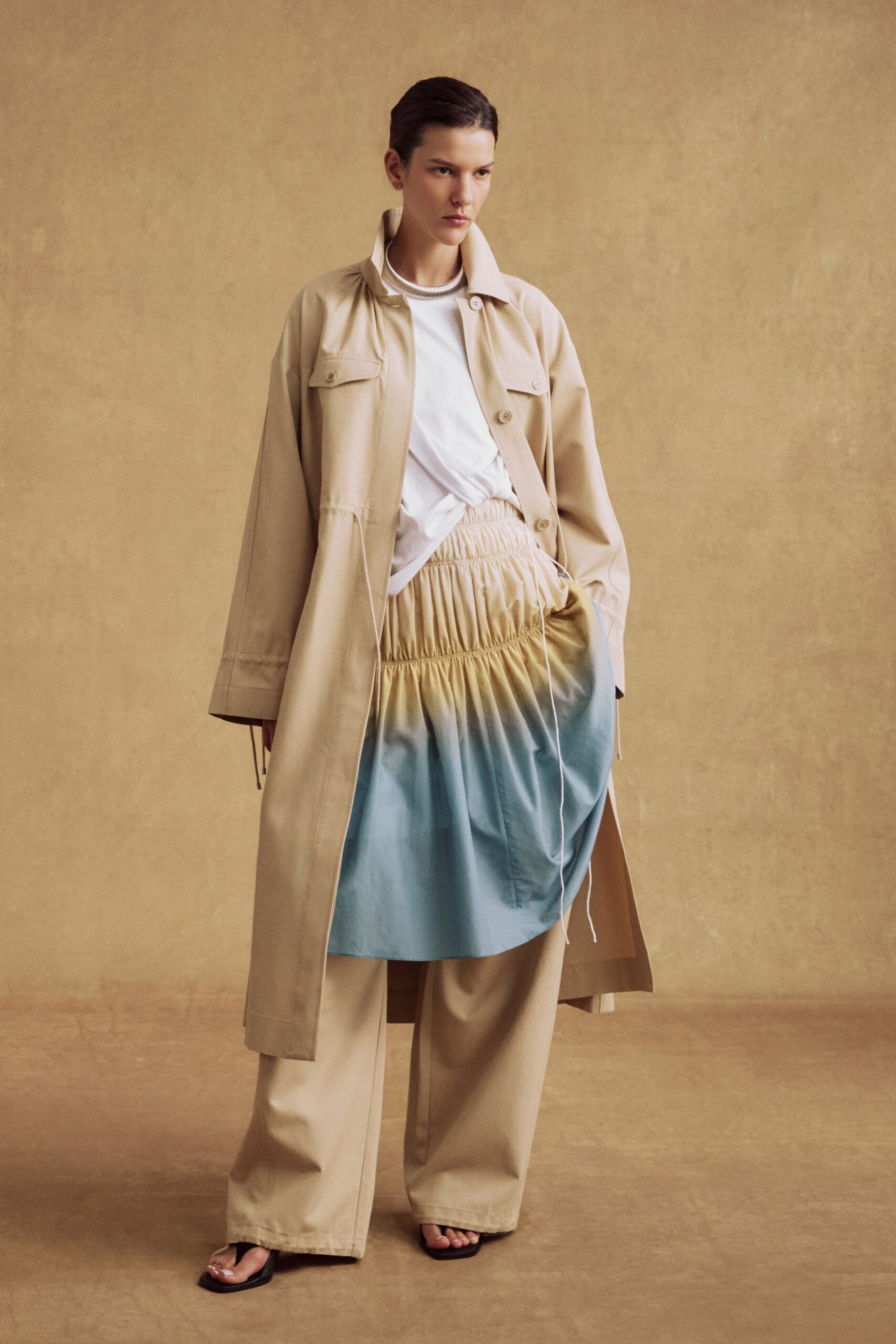 beige coat with white shirt