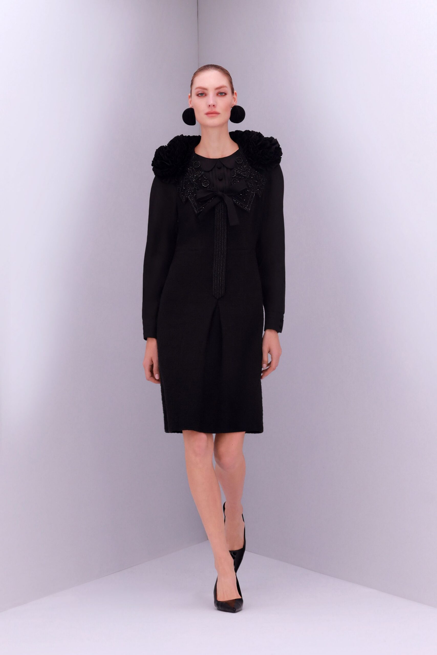 black fitted midi dress with embellishments