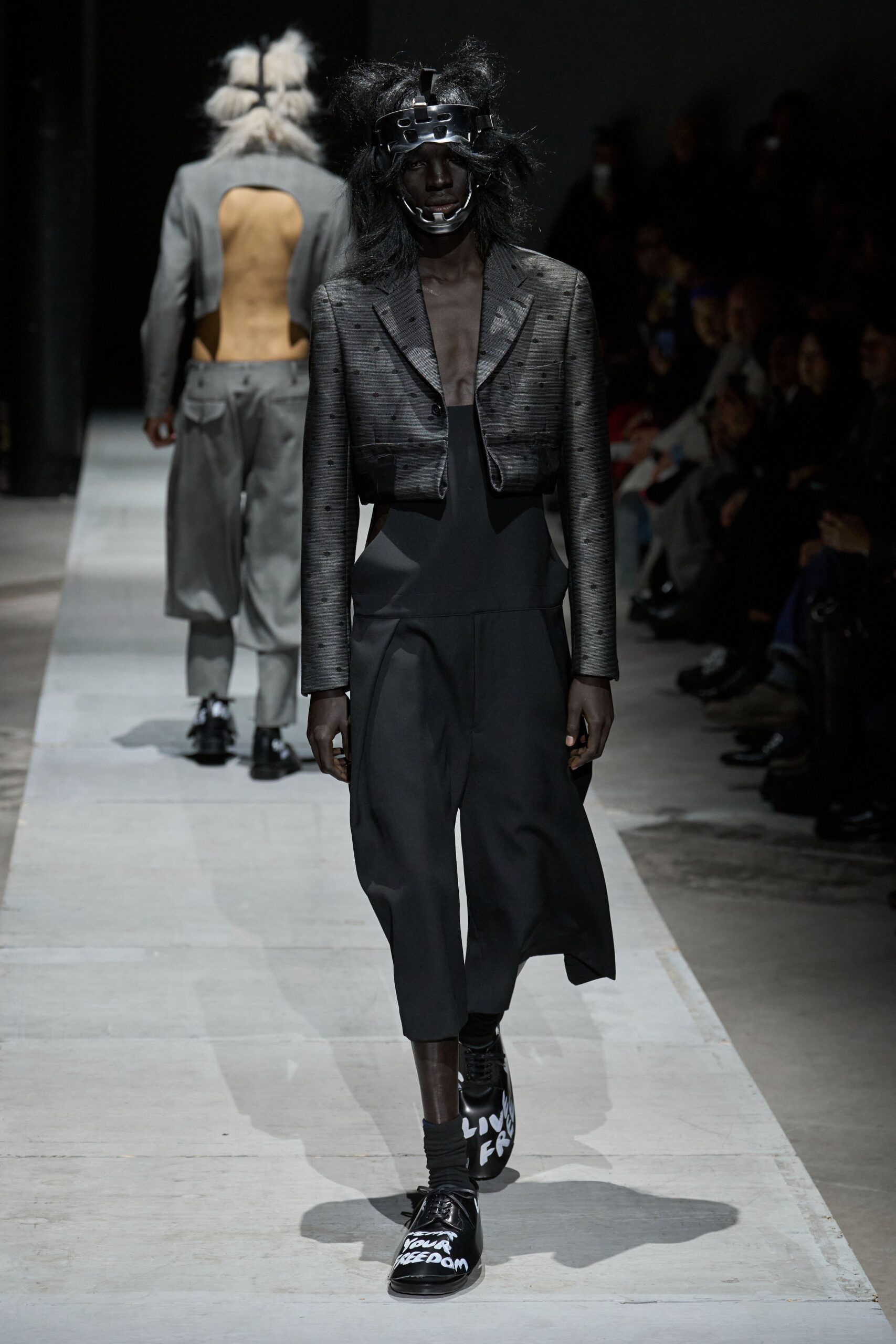 black fitted blazer and jumpsuit