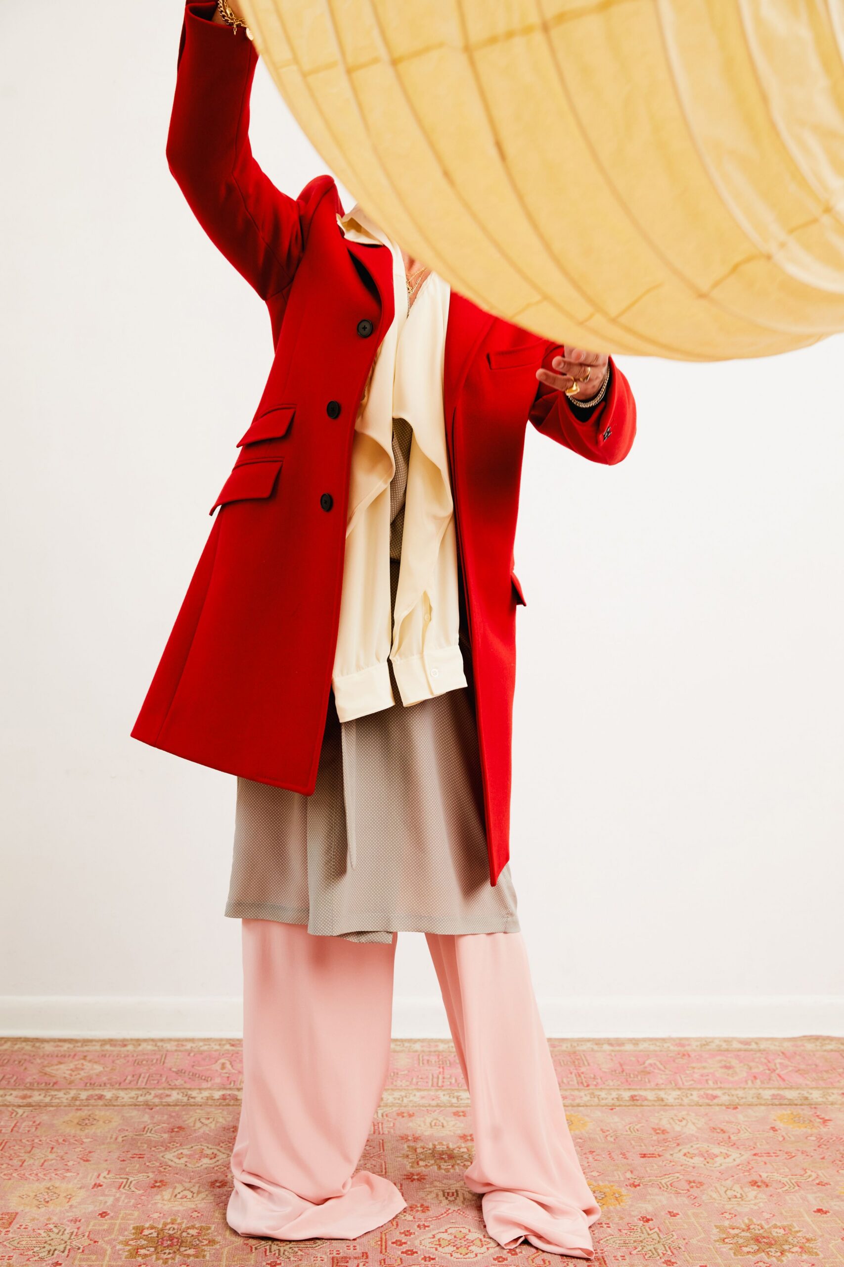 red long-sleeve collared structured buttoned coat
