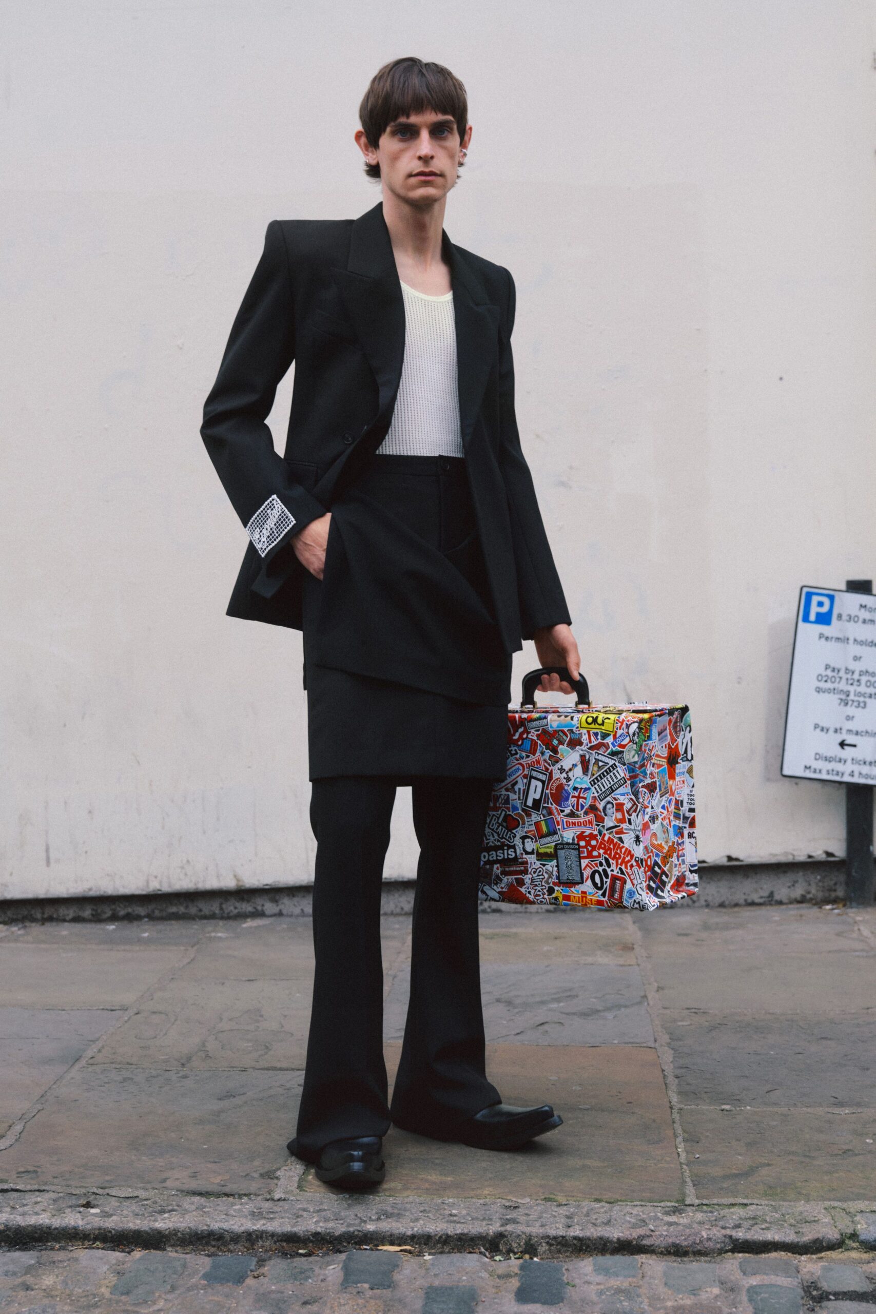 black blazer and white top