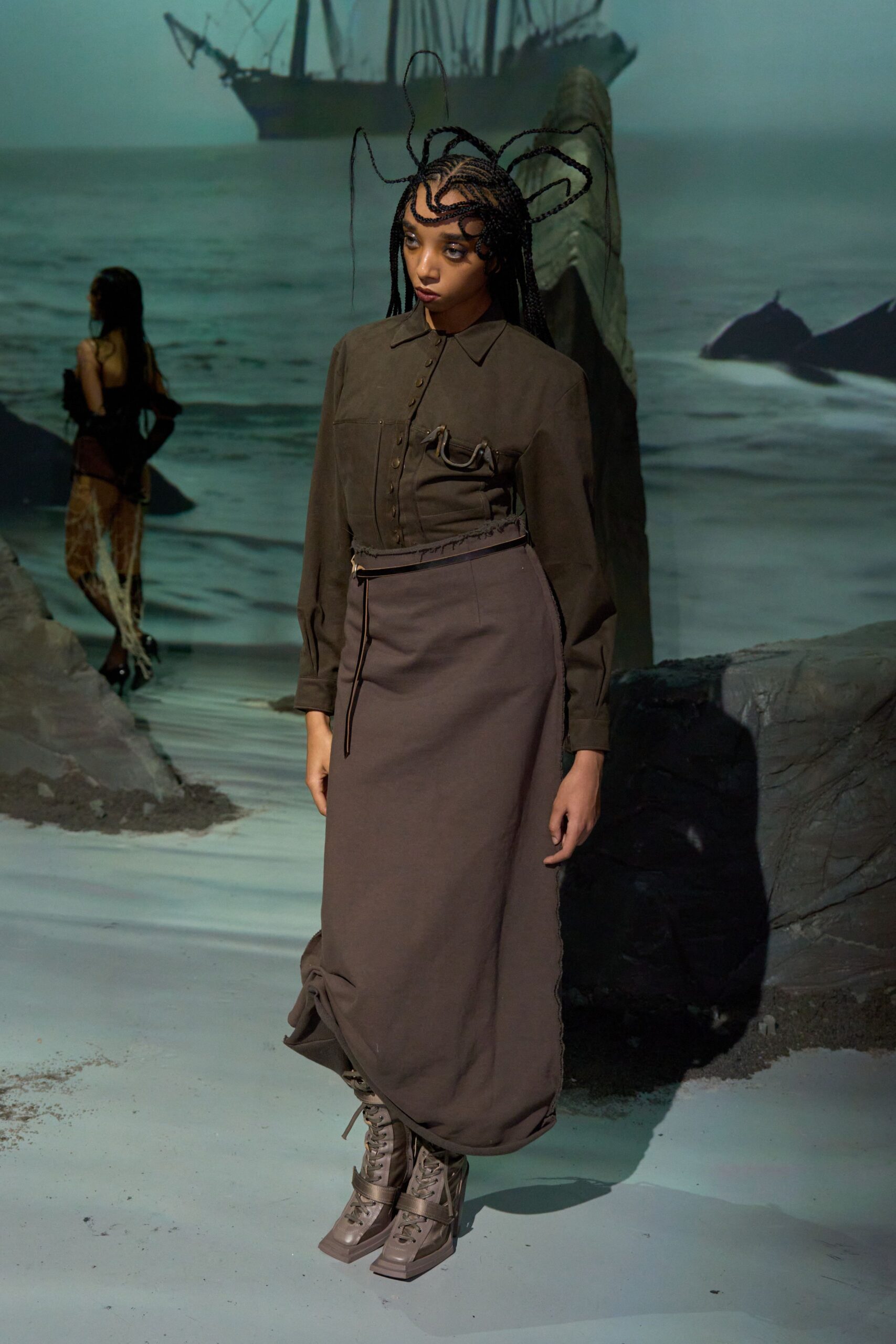 gray shirt brown pleated skirt