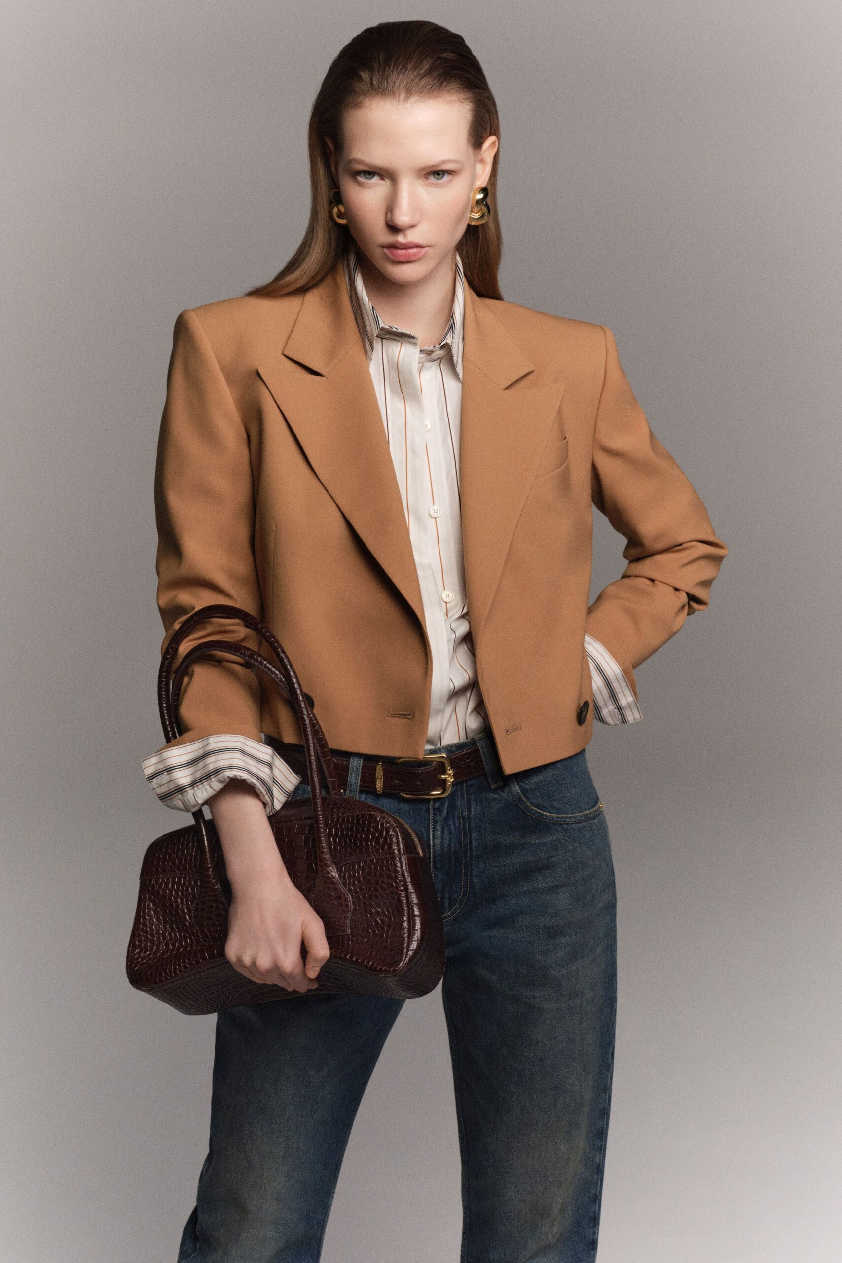 brown tailored blazer with jeans