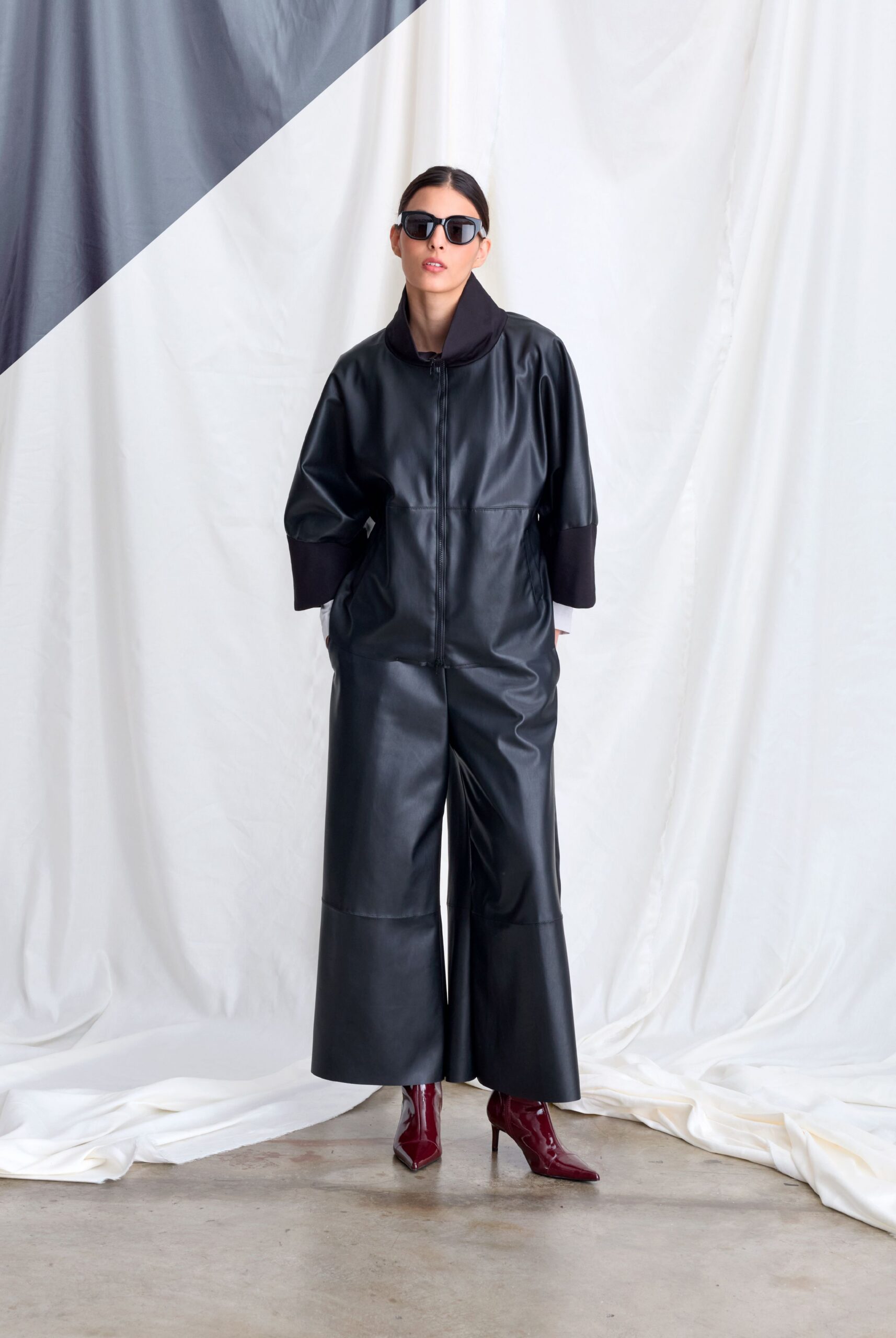 black leather long-sleeve collared relaxed zippered wide-leg jumpsuit