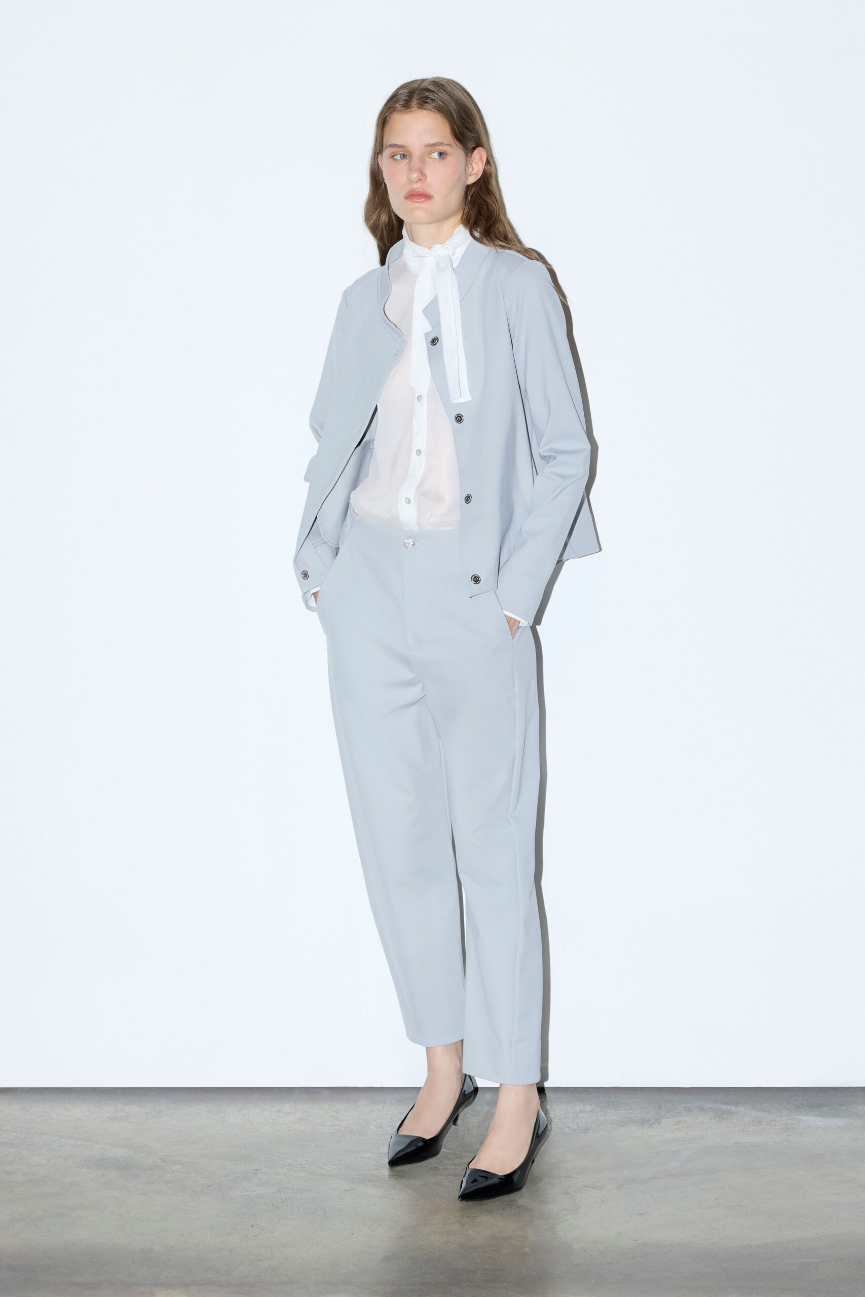 gray long-sleeve collared tailored jacket