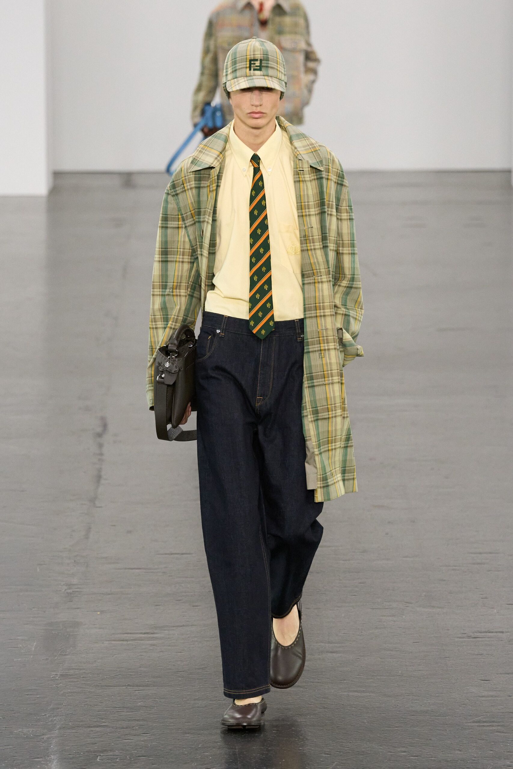 checked green coat with denim pants