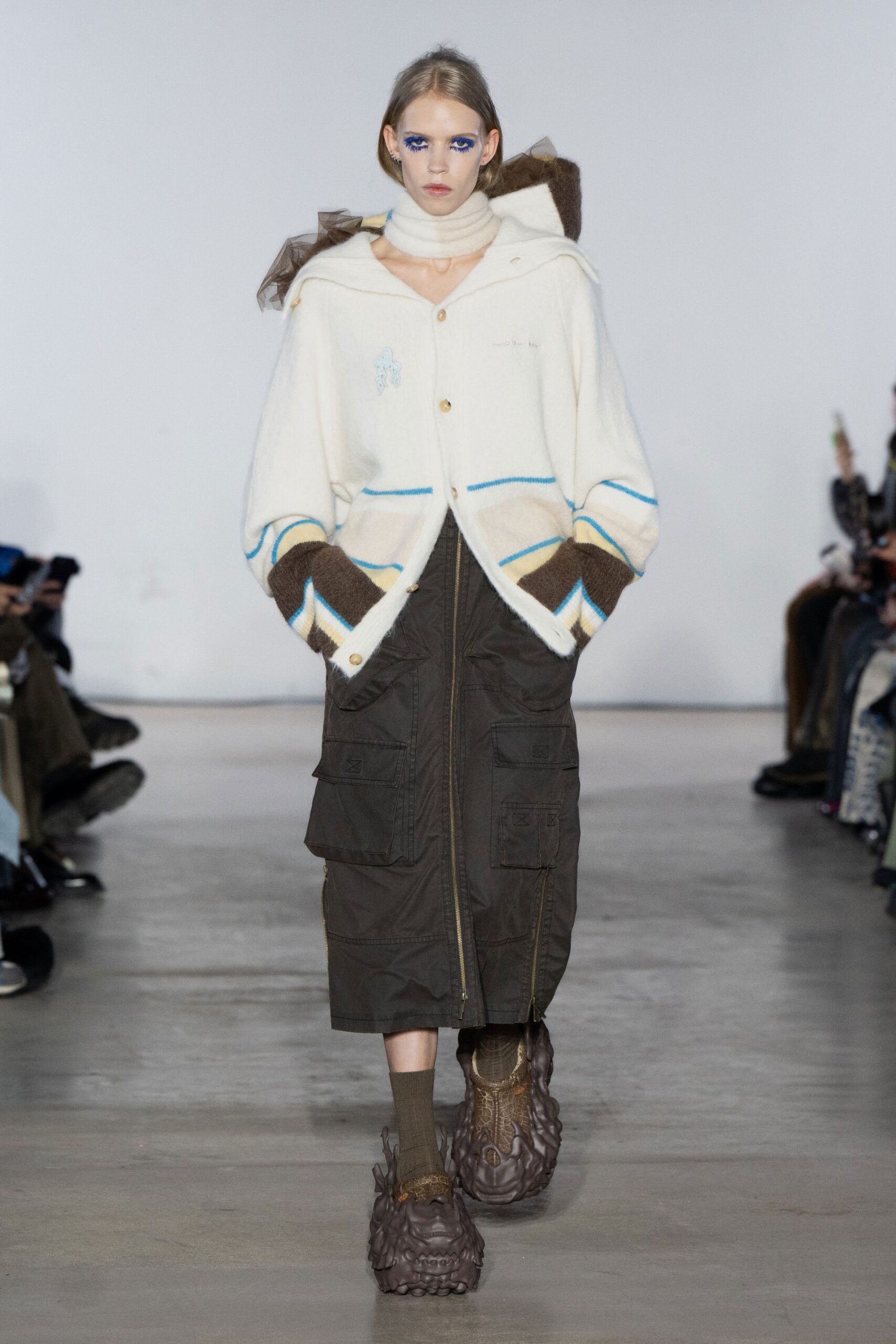 relaxed white jacket with brown skirt