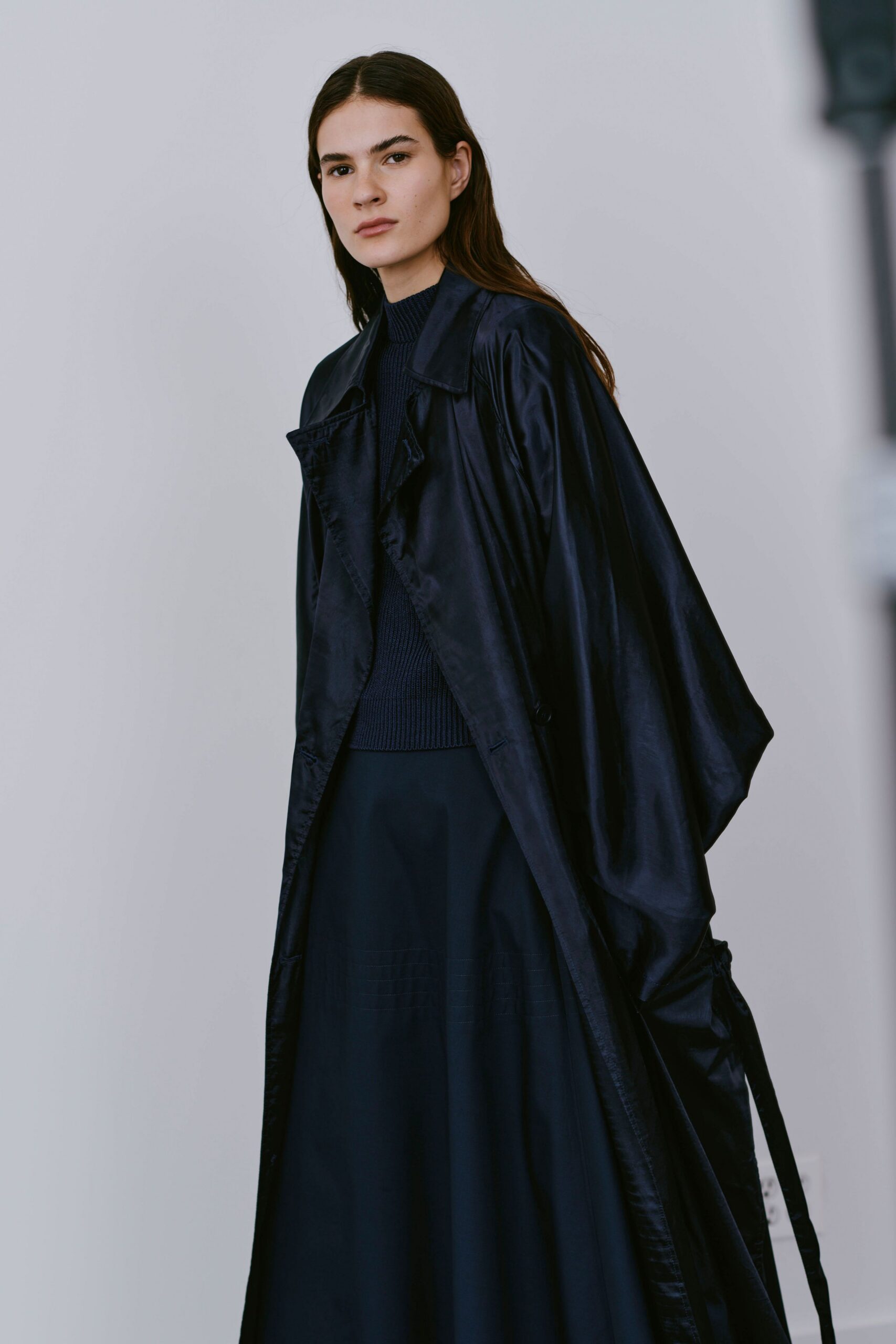 black silk coat with navy top