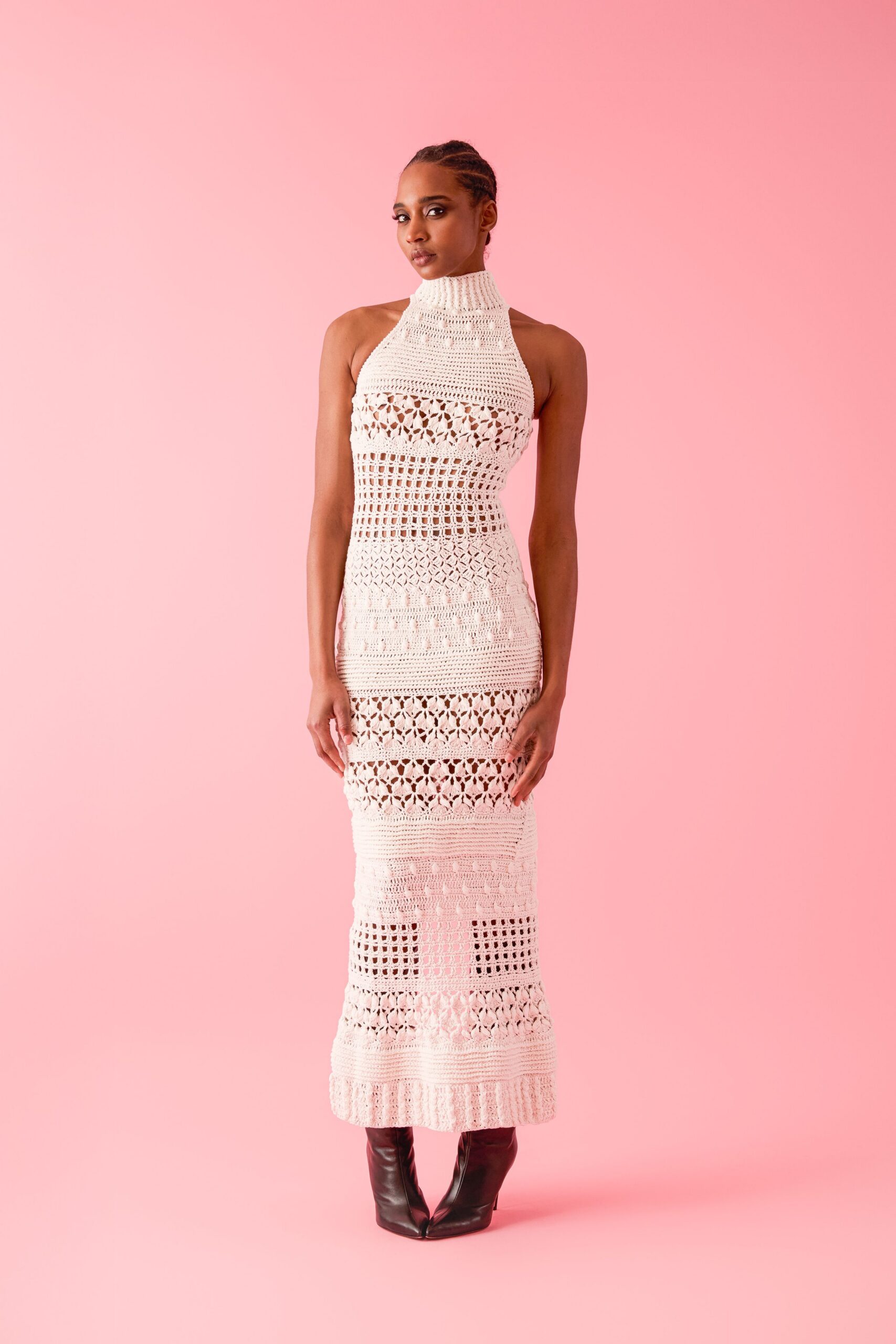 white crochet maxi gown with black boots