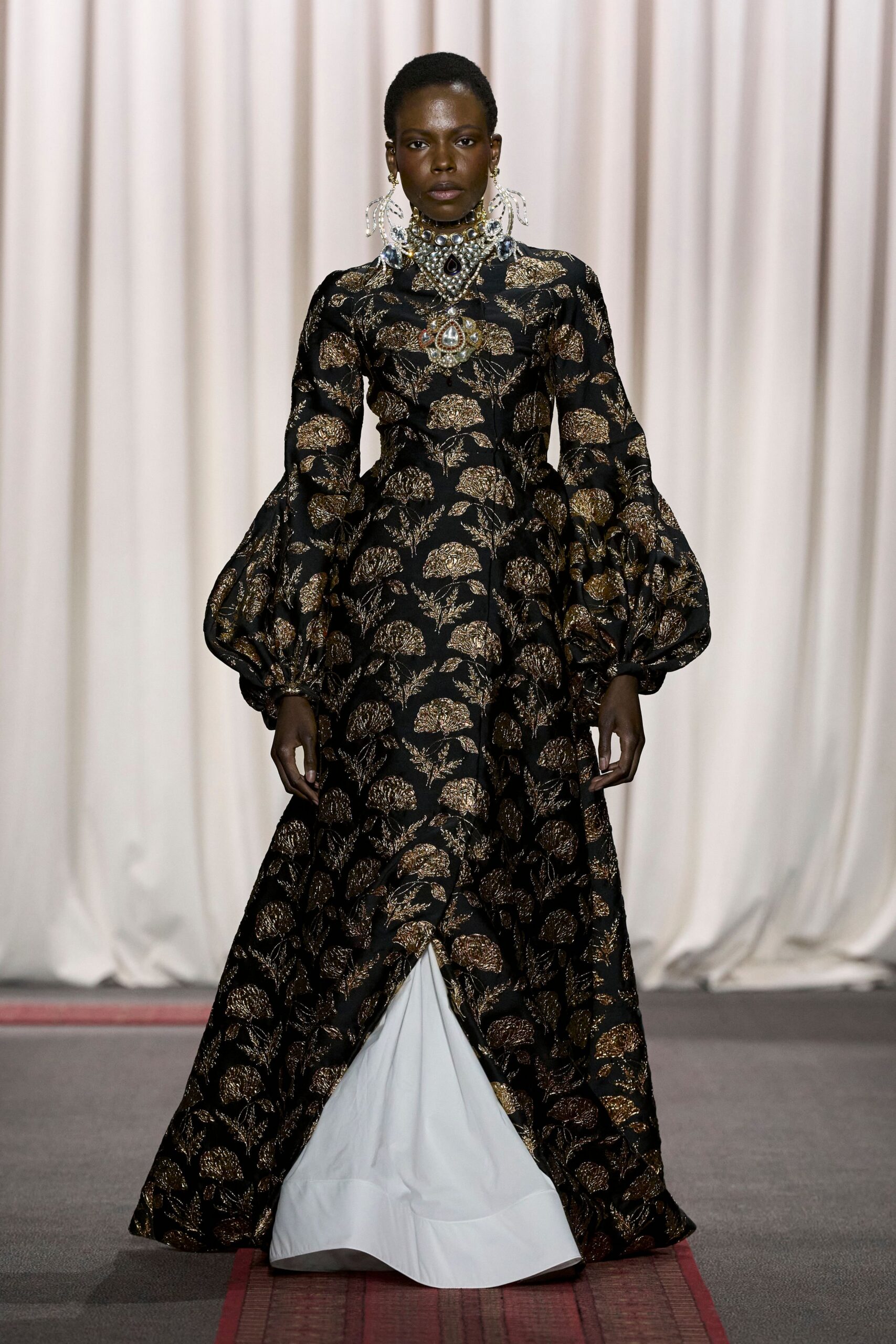 black and gold embroidered gown