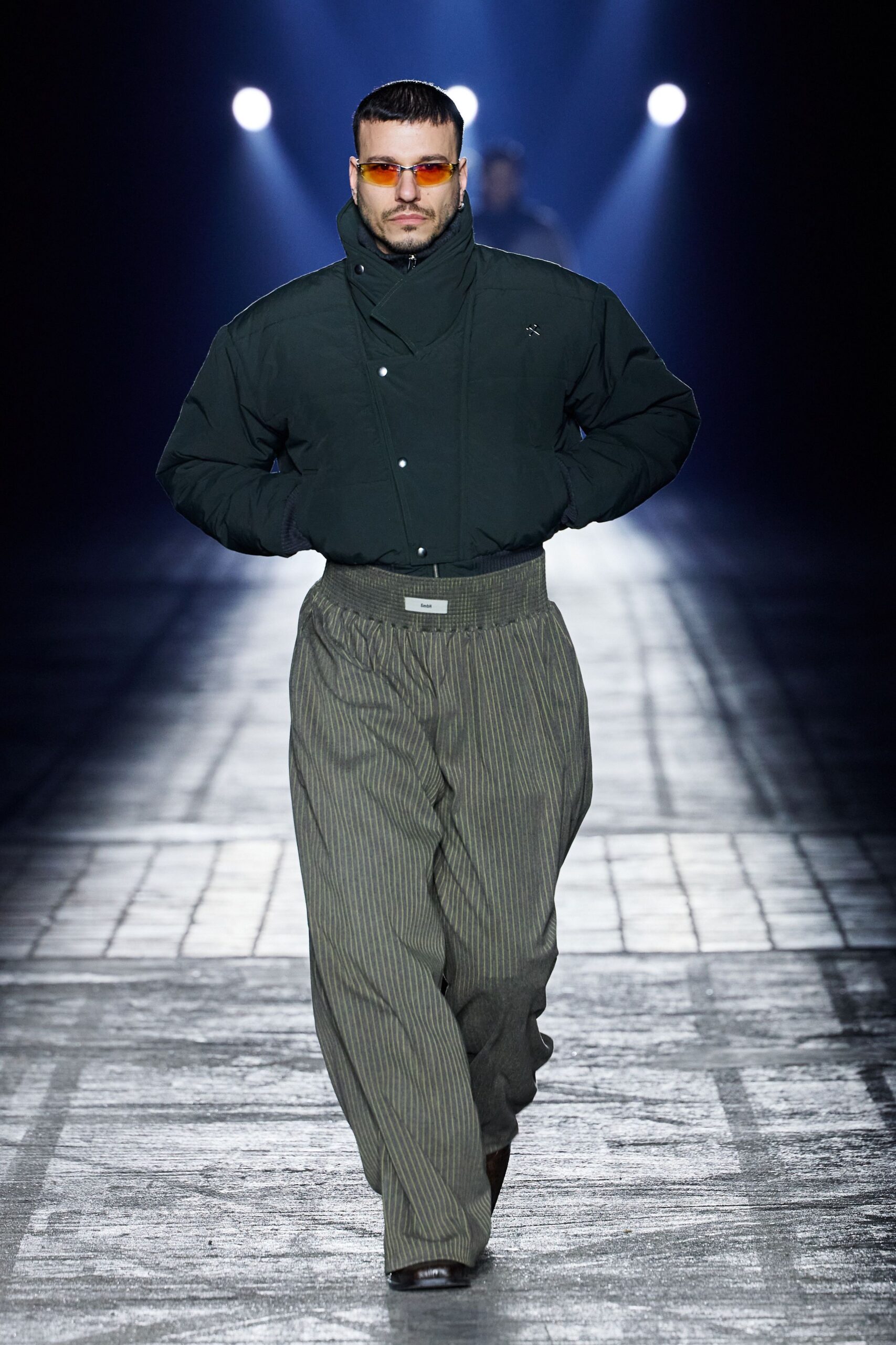 green relaxed jacket with gray pants