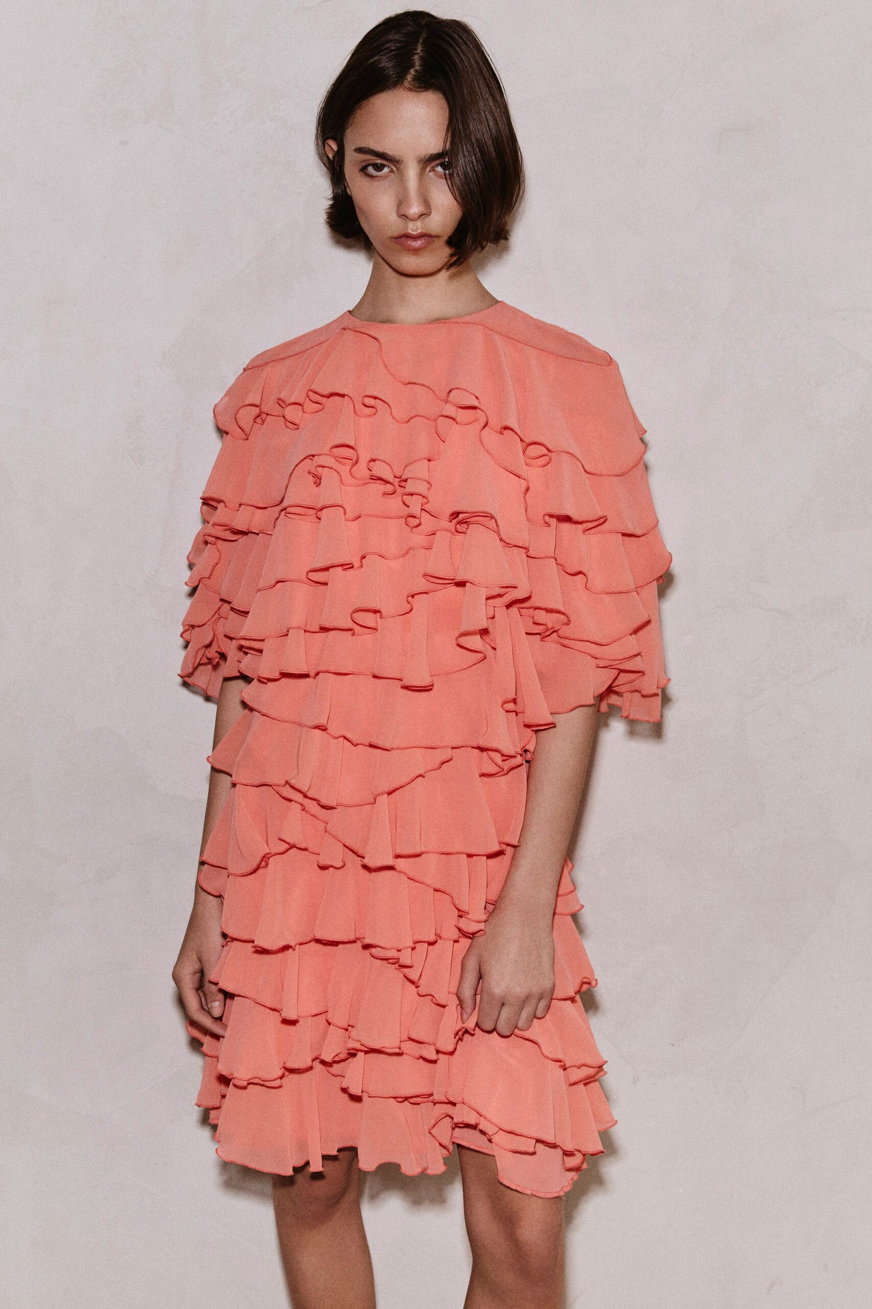 pink ruffled mini dress