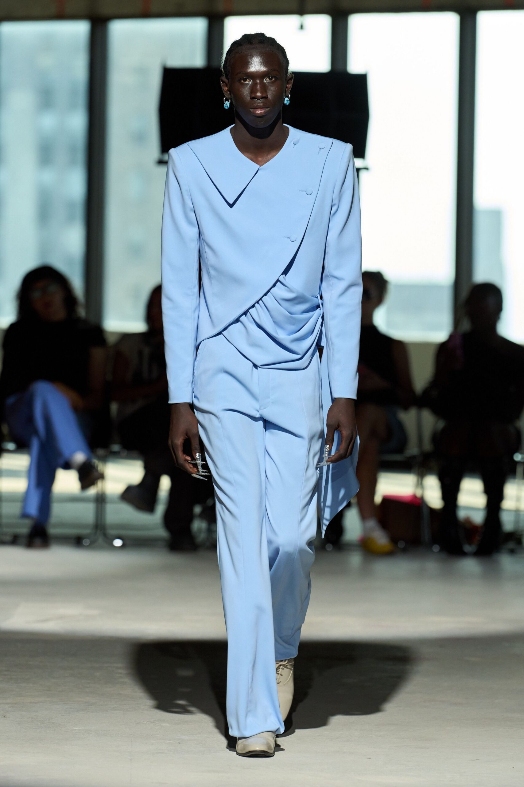 blue fitted suit with draped detail