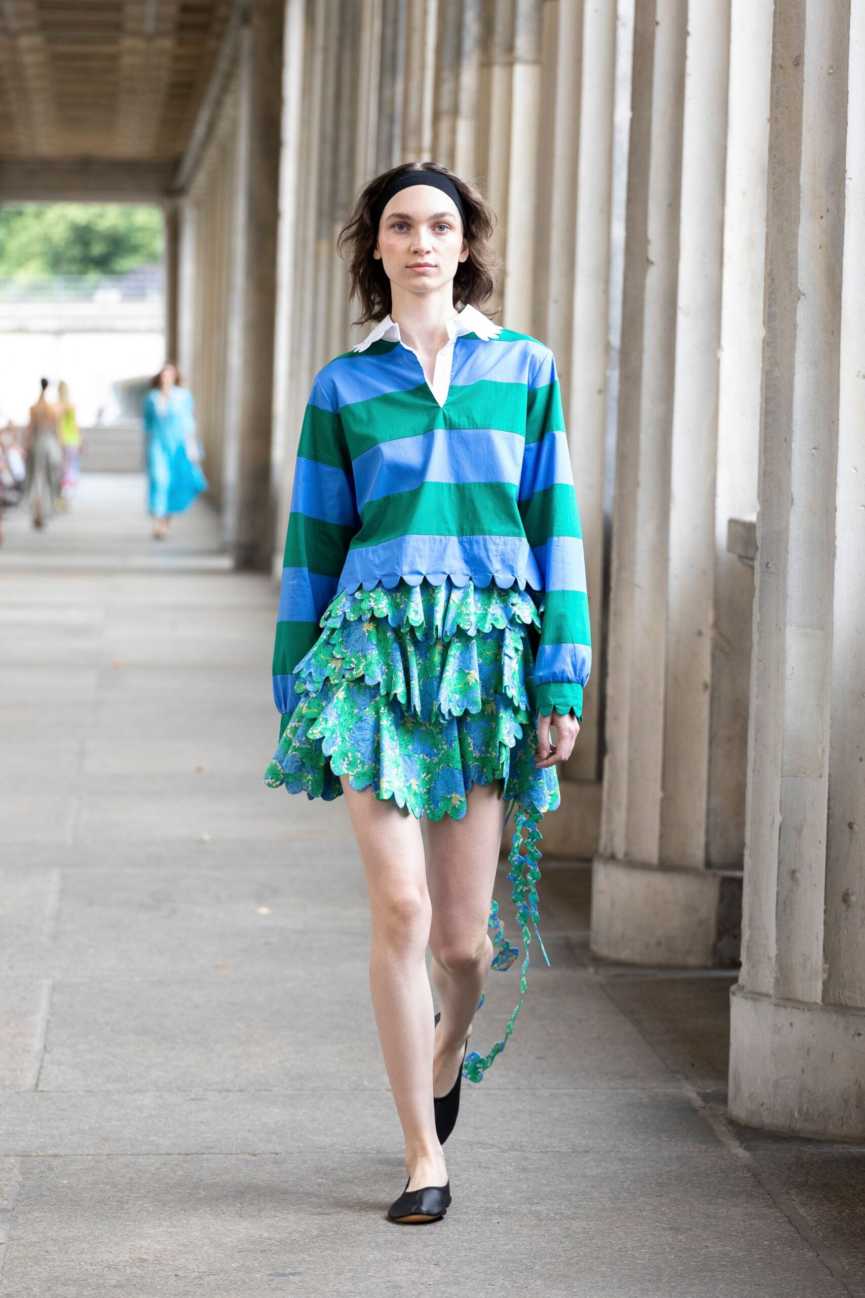 green fitted ruffled mini skirt