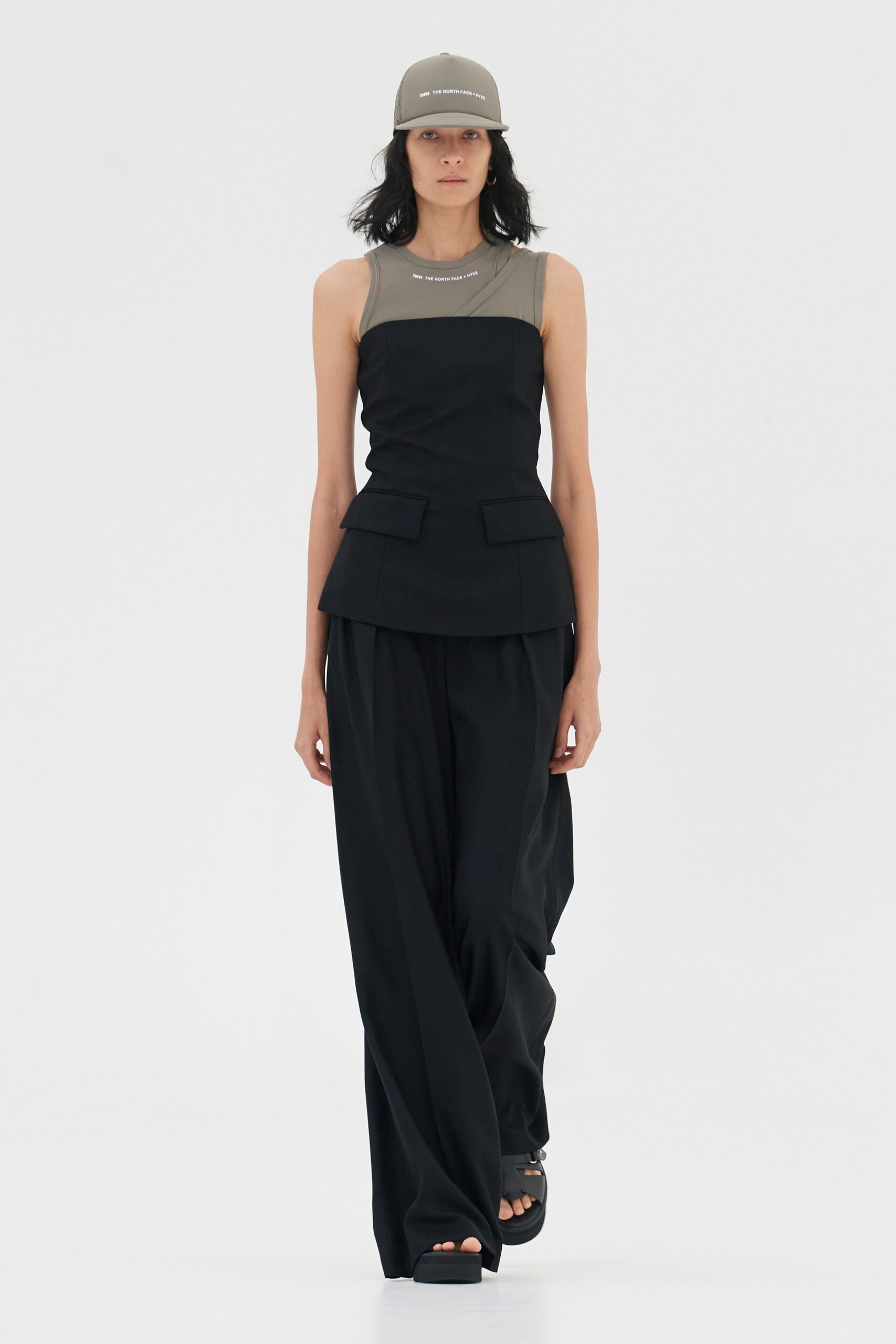 black cotton sleeveless high-neck fitted top