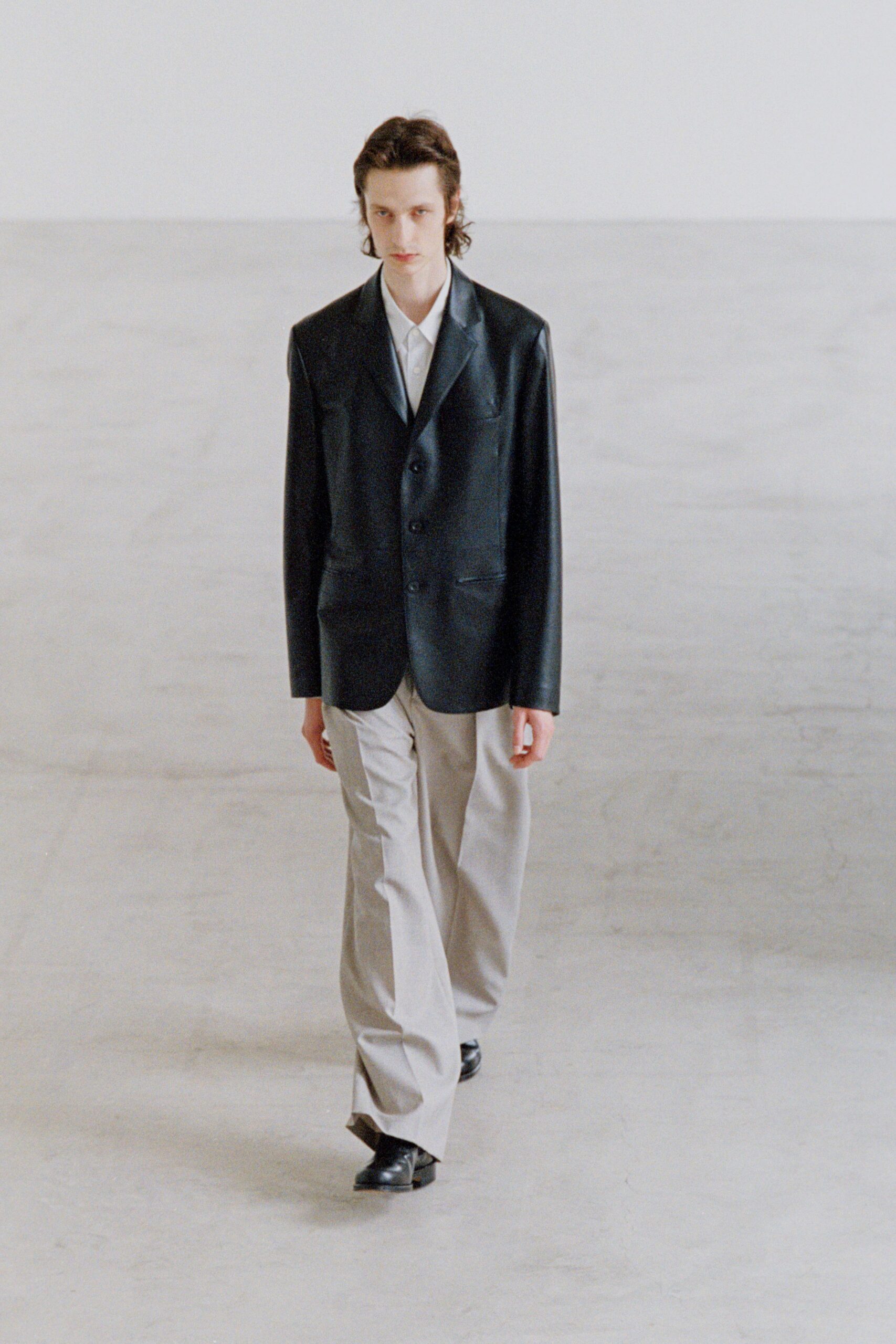black leather long-sleeve collared structured blazer