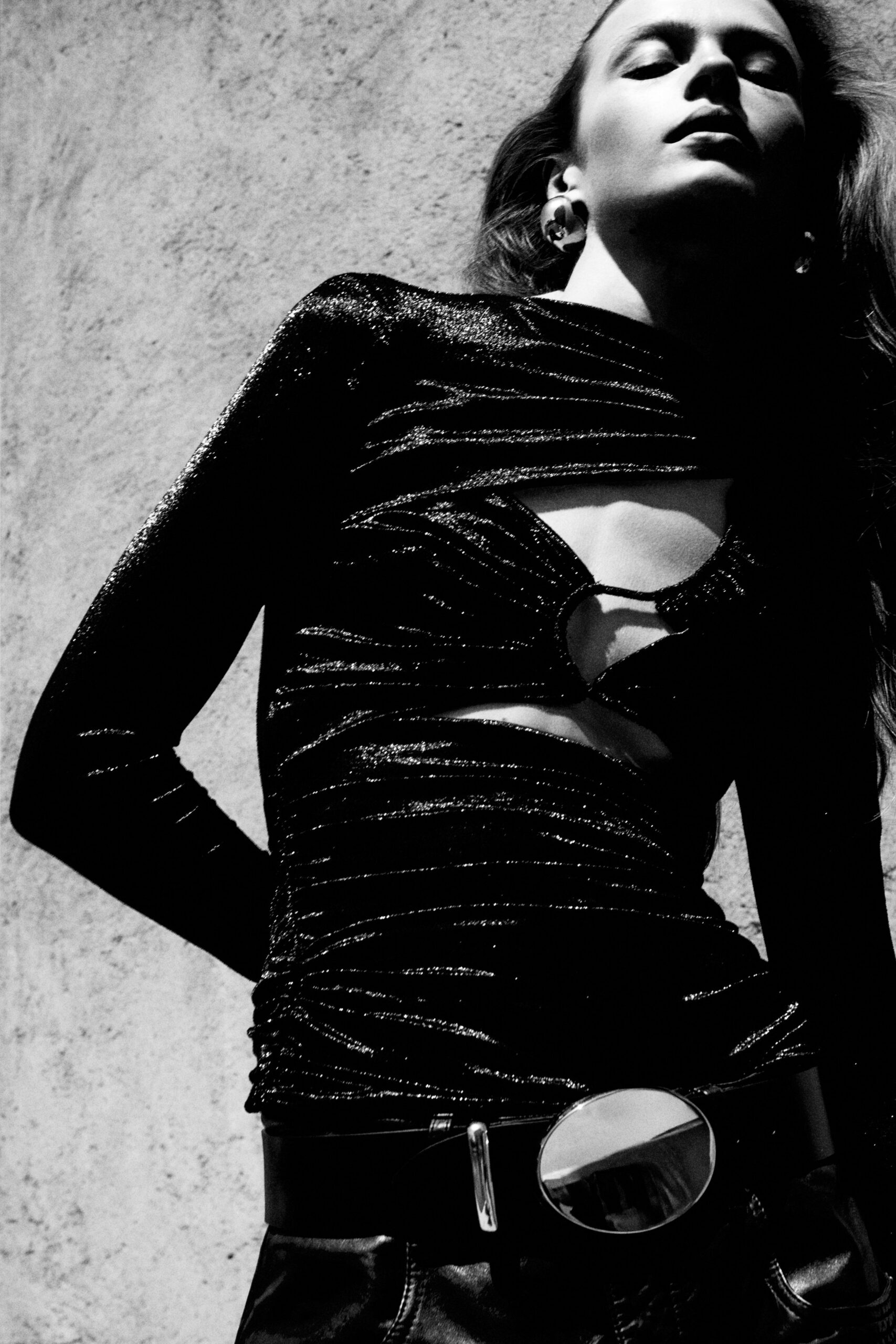 black fitted top and slim pants