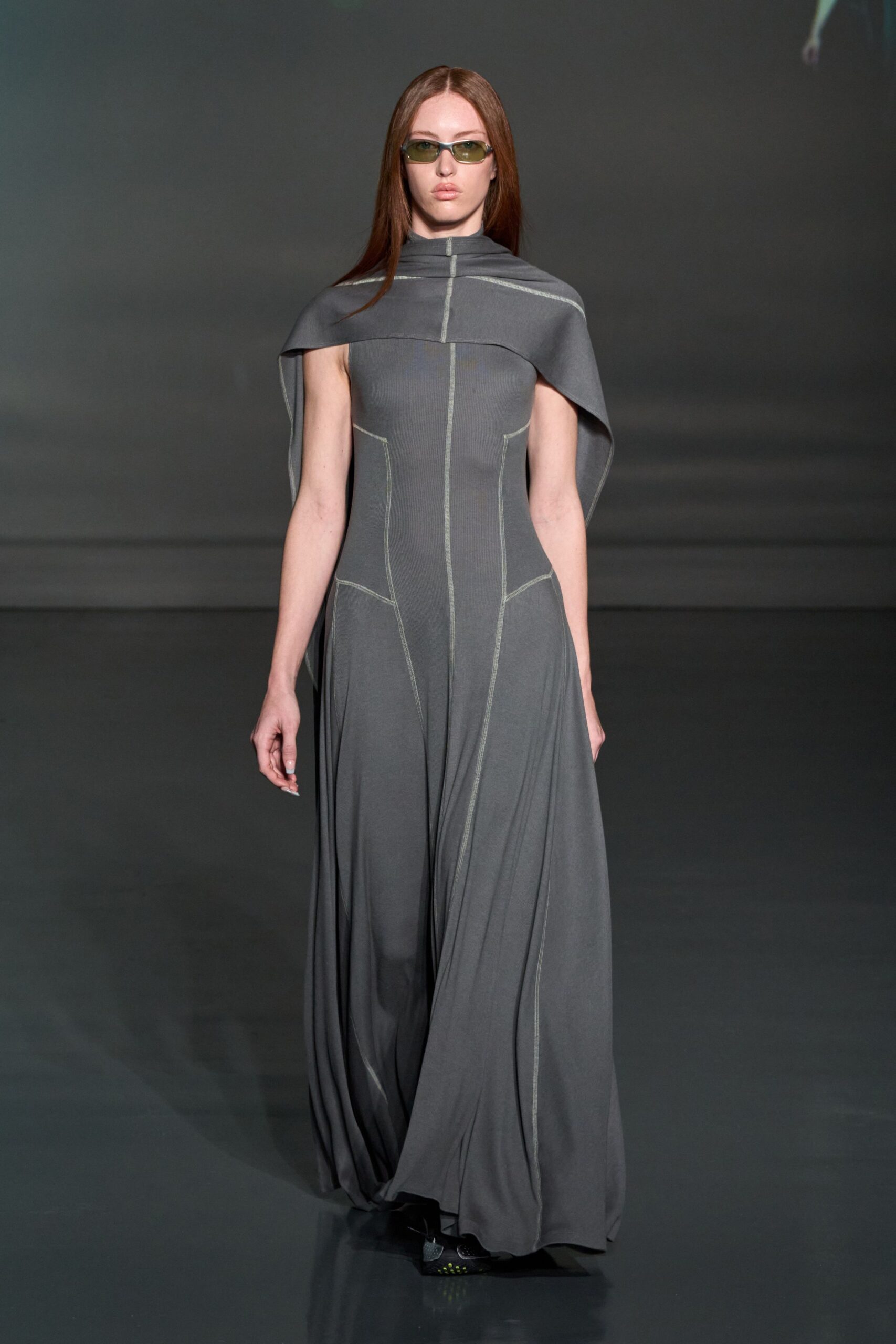 gray cotton sleeveless high-neck fitted draped flowing gown