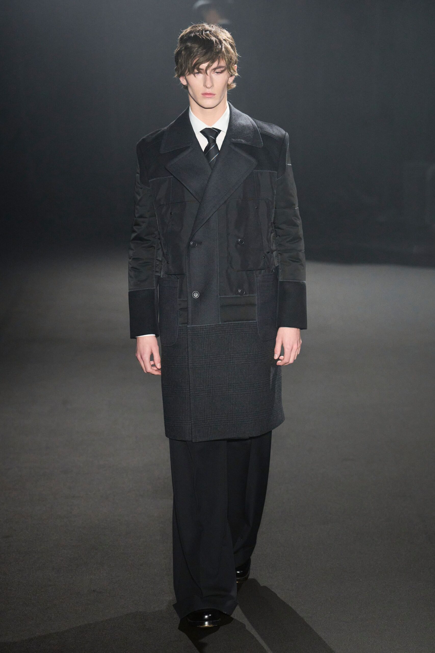 black wool long-sleeve collared structured buttoned layered coat