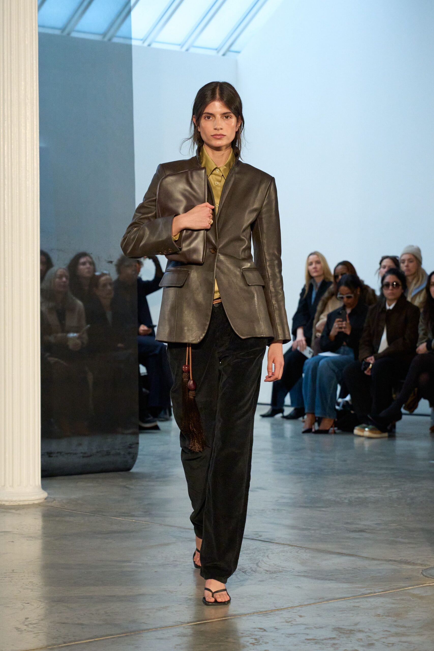 black leather blazer with green shirt