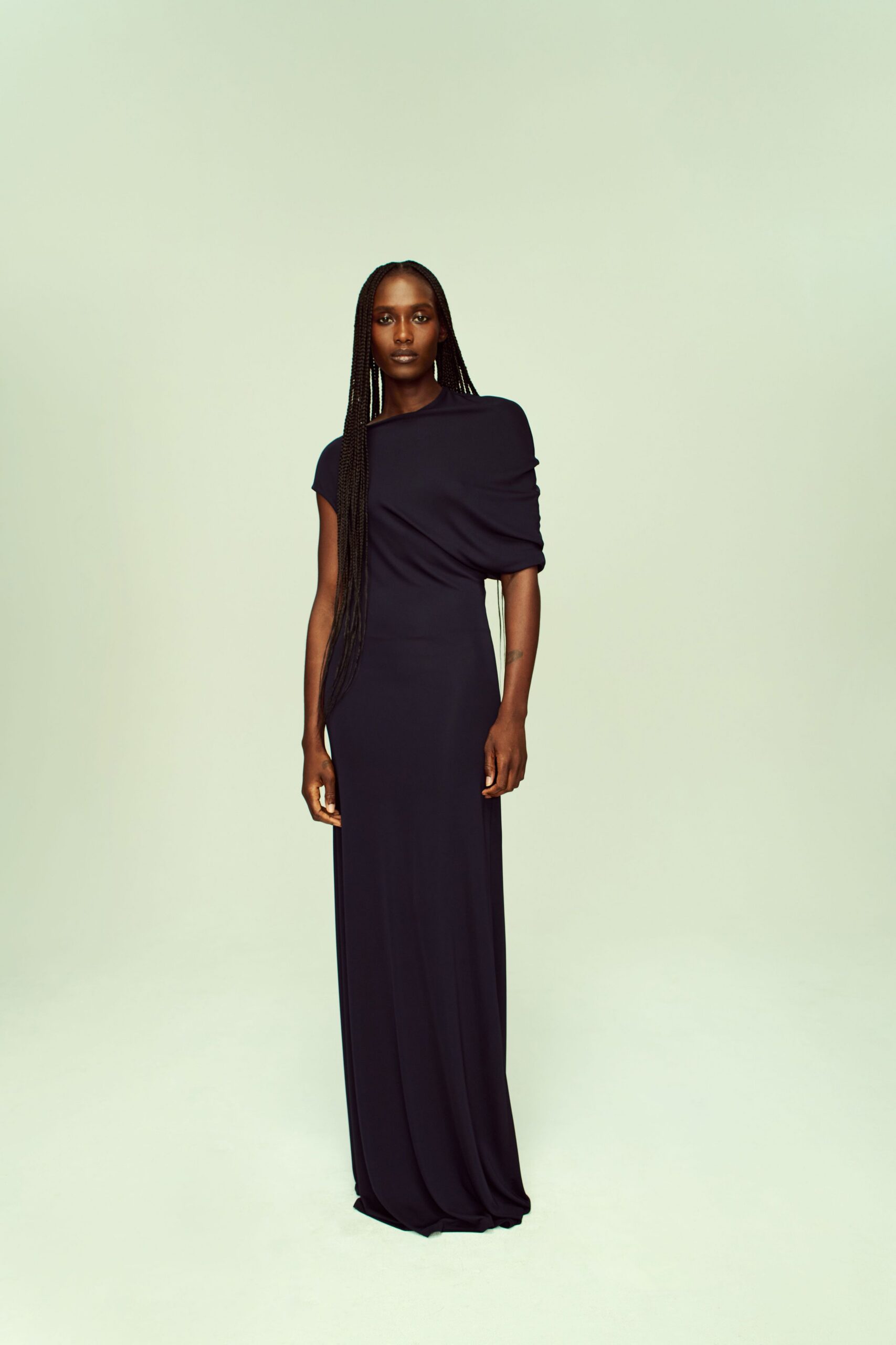 black off-shoulder draped gown