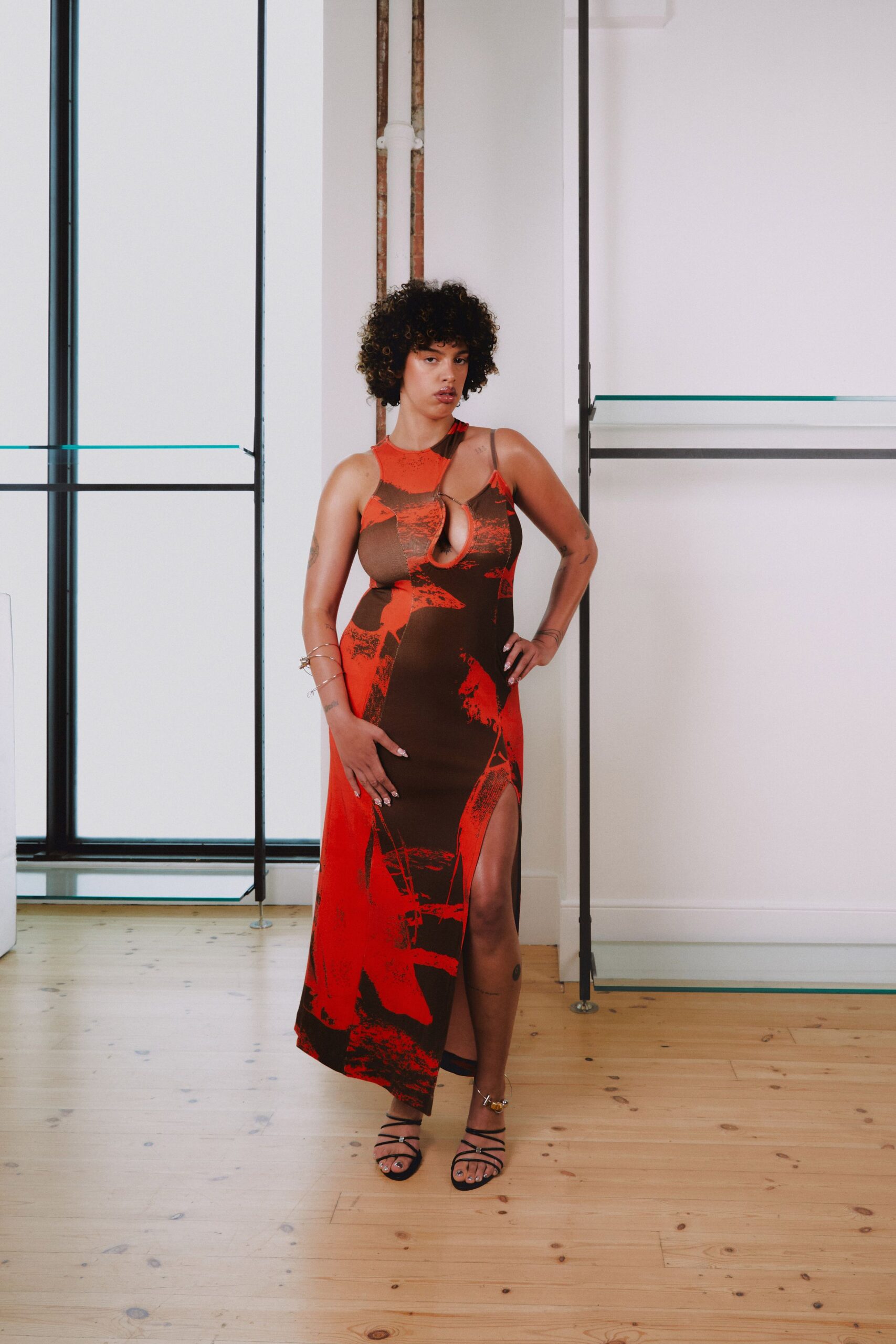 red silk sleeveless high-neck fitted midi dress