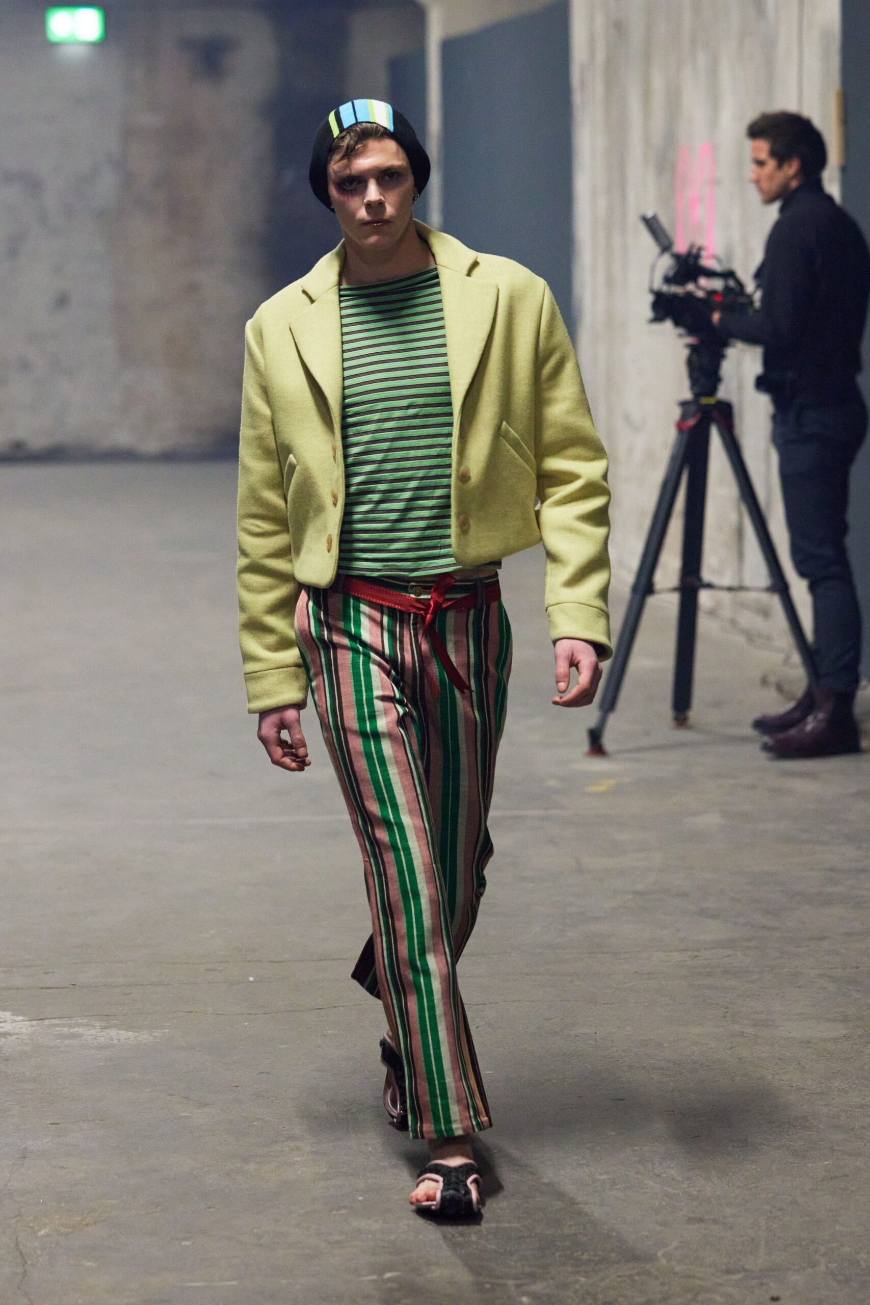 yellow jacket green striped shirt
