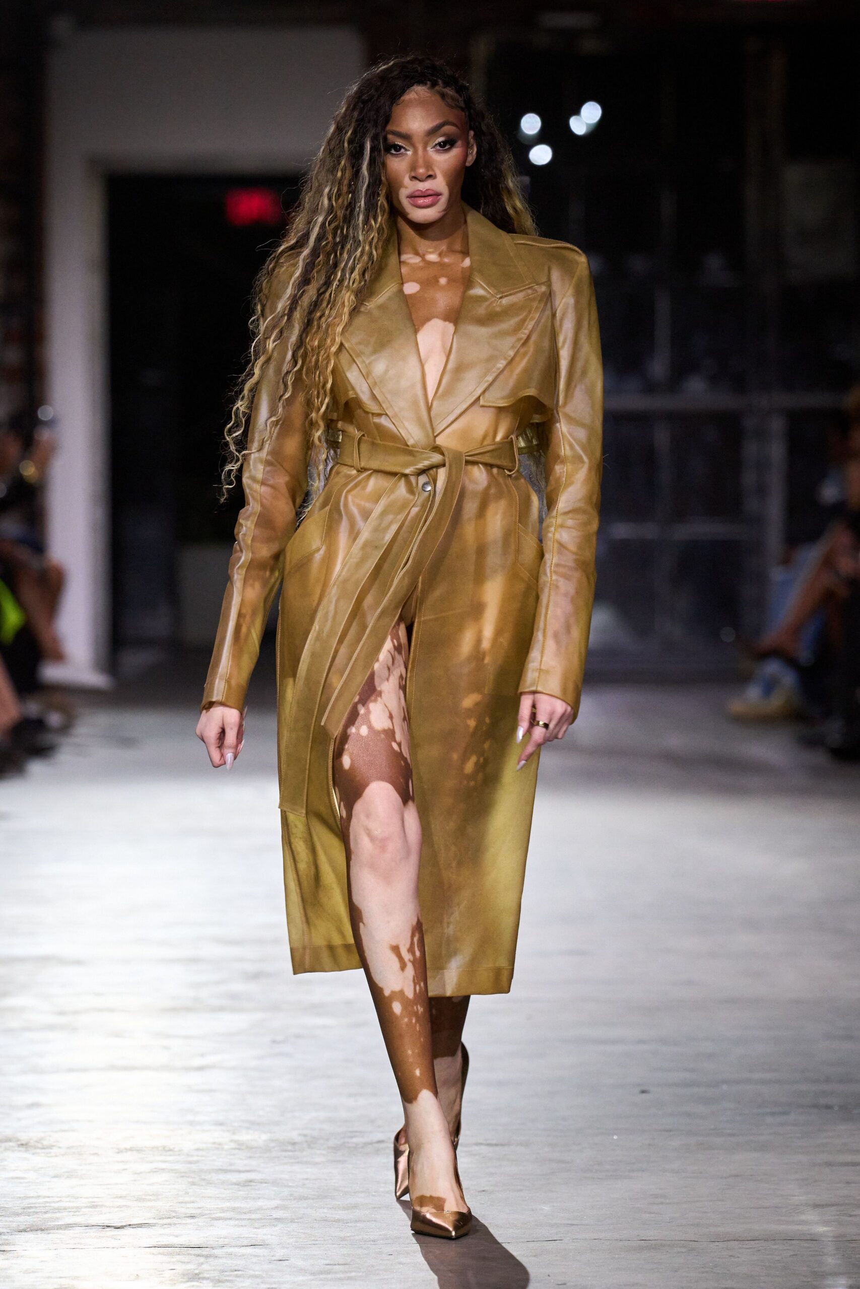 gold vinyl long-sleeve collared fitted zippered belted coat
