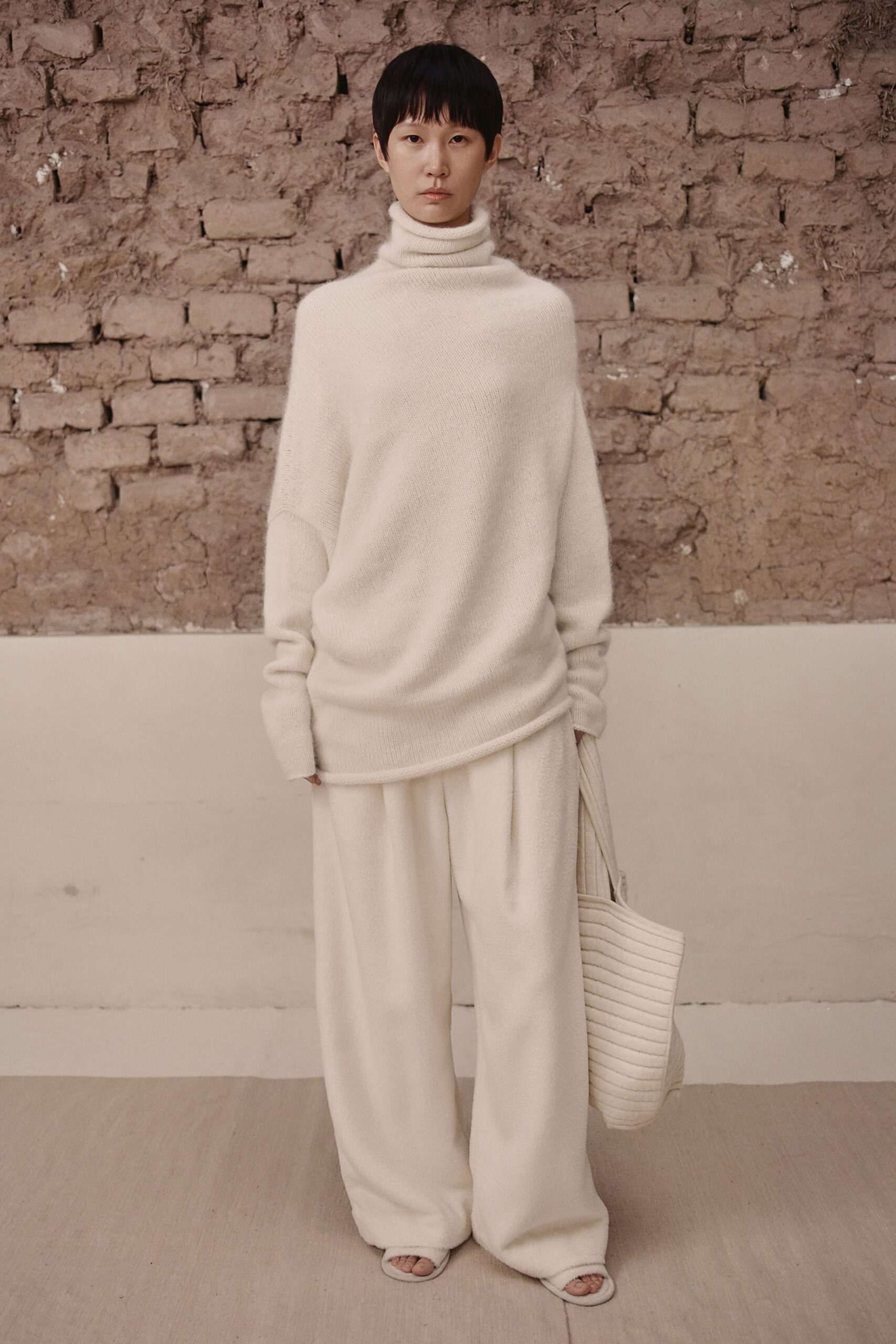 white relaxed sweater and pants