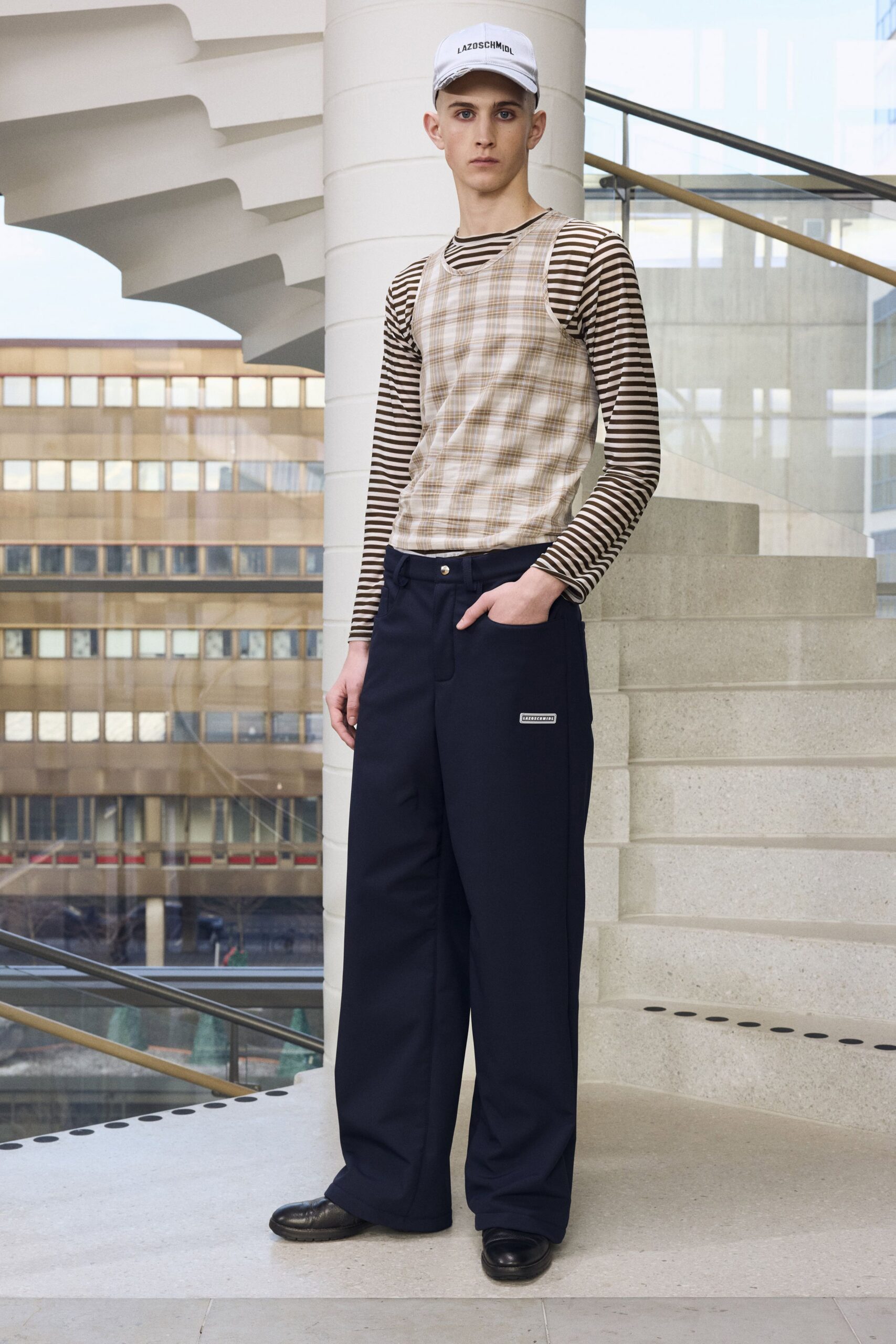 beige striped top navy pants