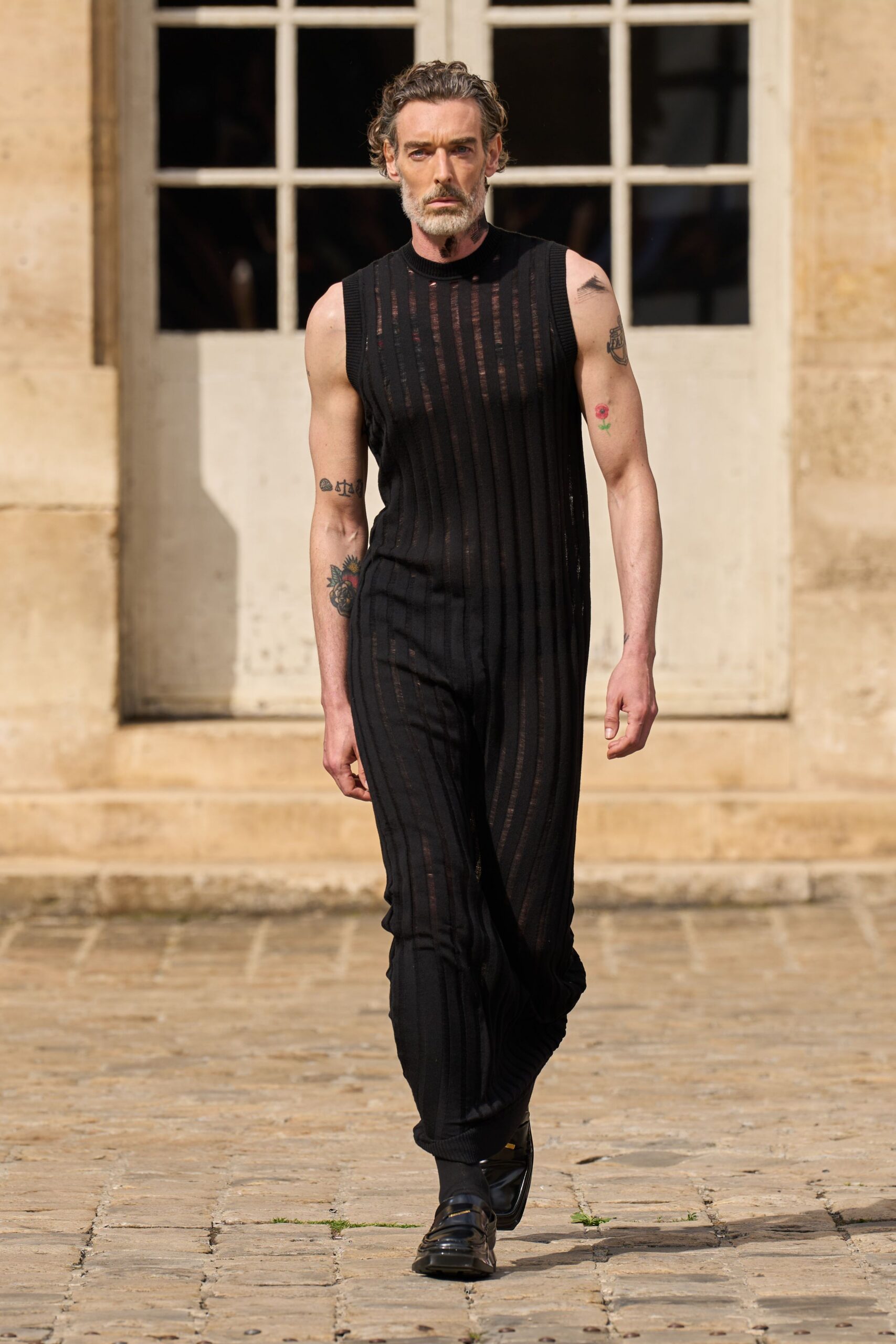 black cotton sleeveless high-neck fitted ribbed sheer jumpsuit