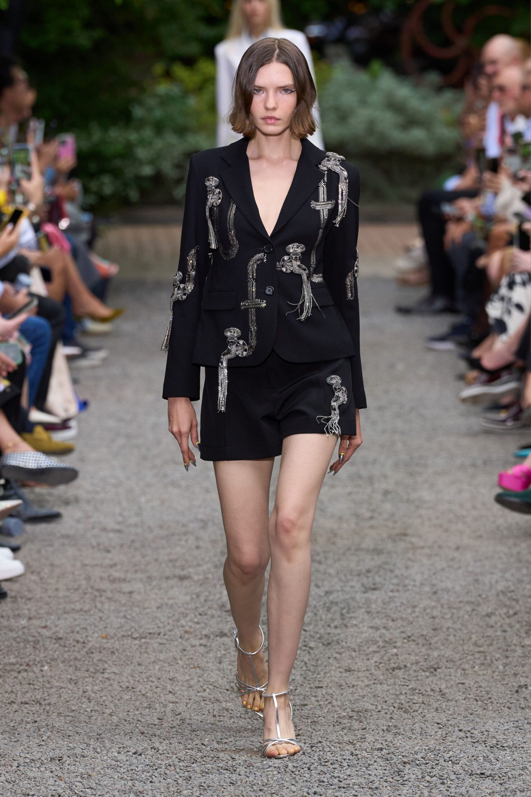 black tailored blazer with embroidered shorts
