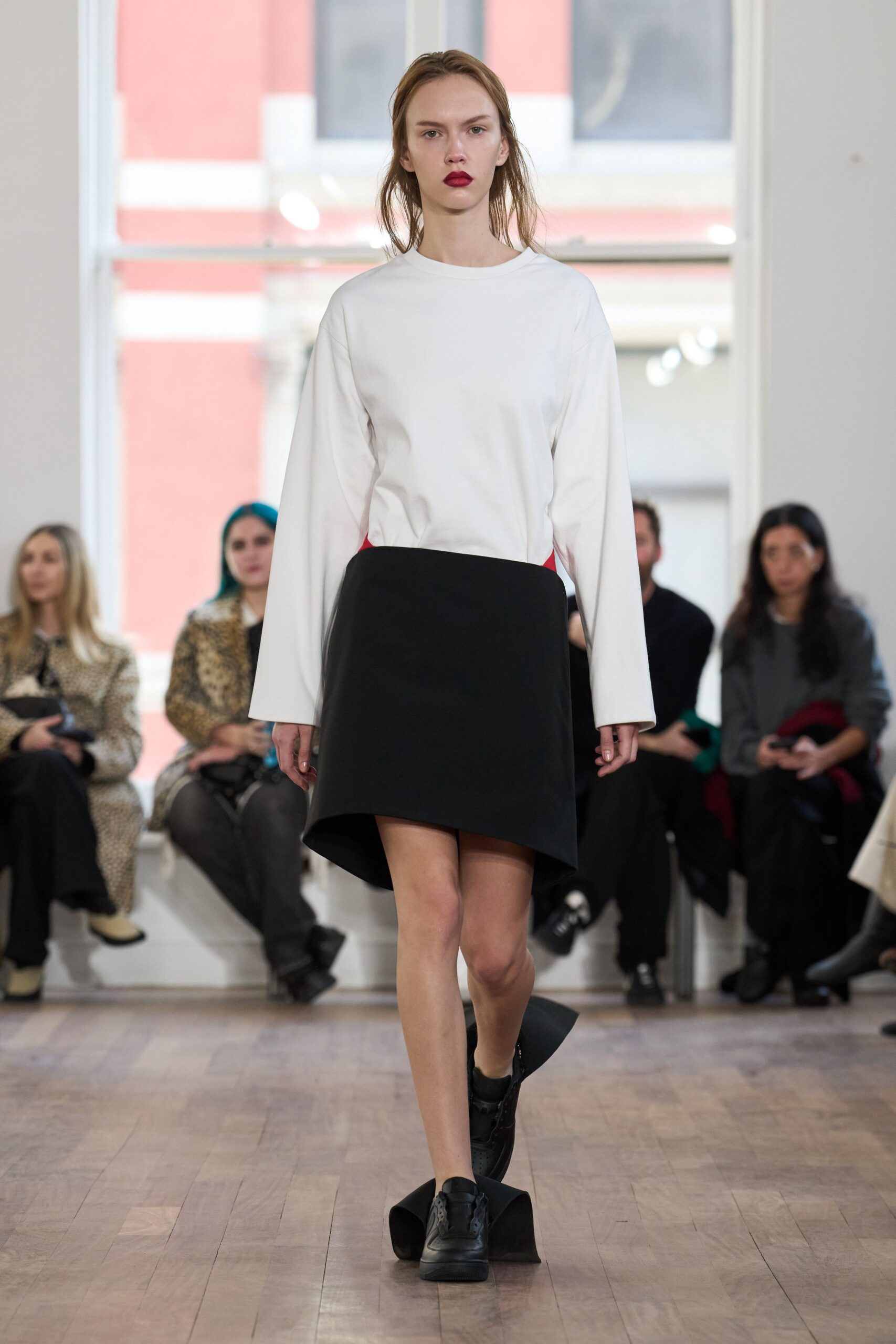 black cotton asymmetric fitted mini skirt
