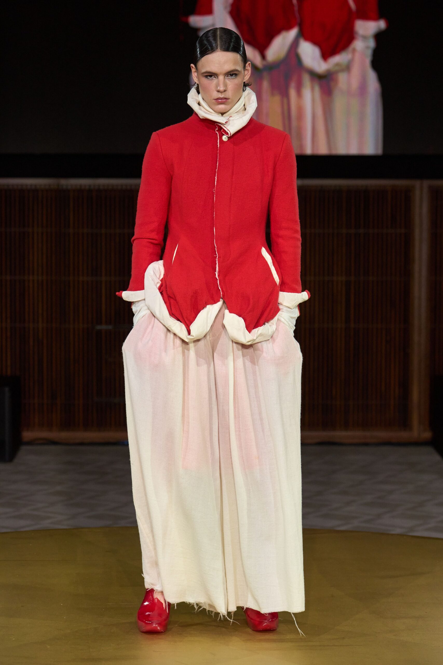 red cotton long-sleeve collared fitted zippered layered coat