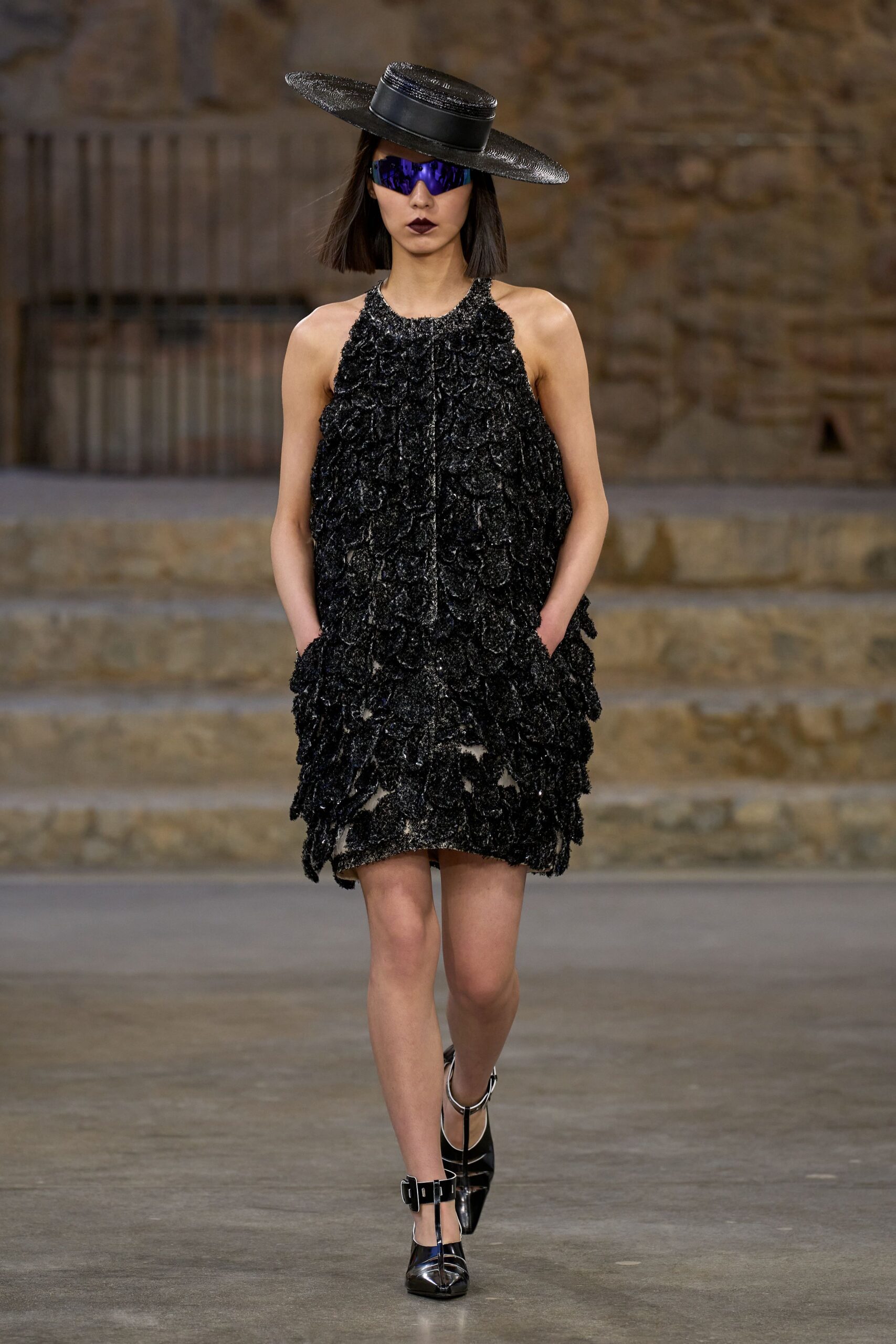 black ruffled mini dress with accessories