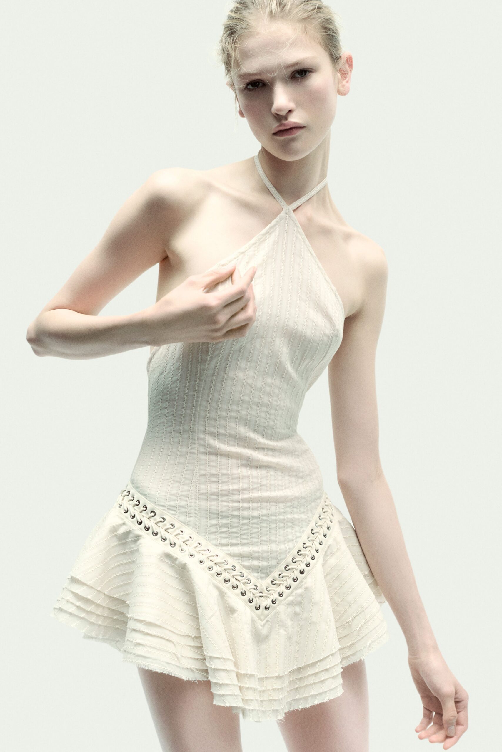 fitted white pleated halter dress