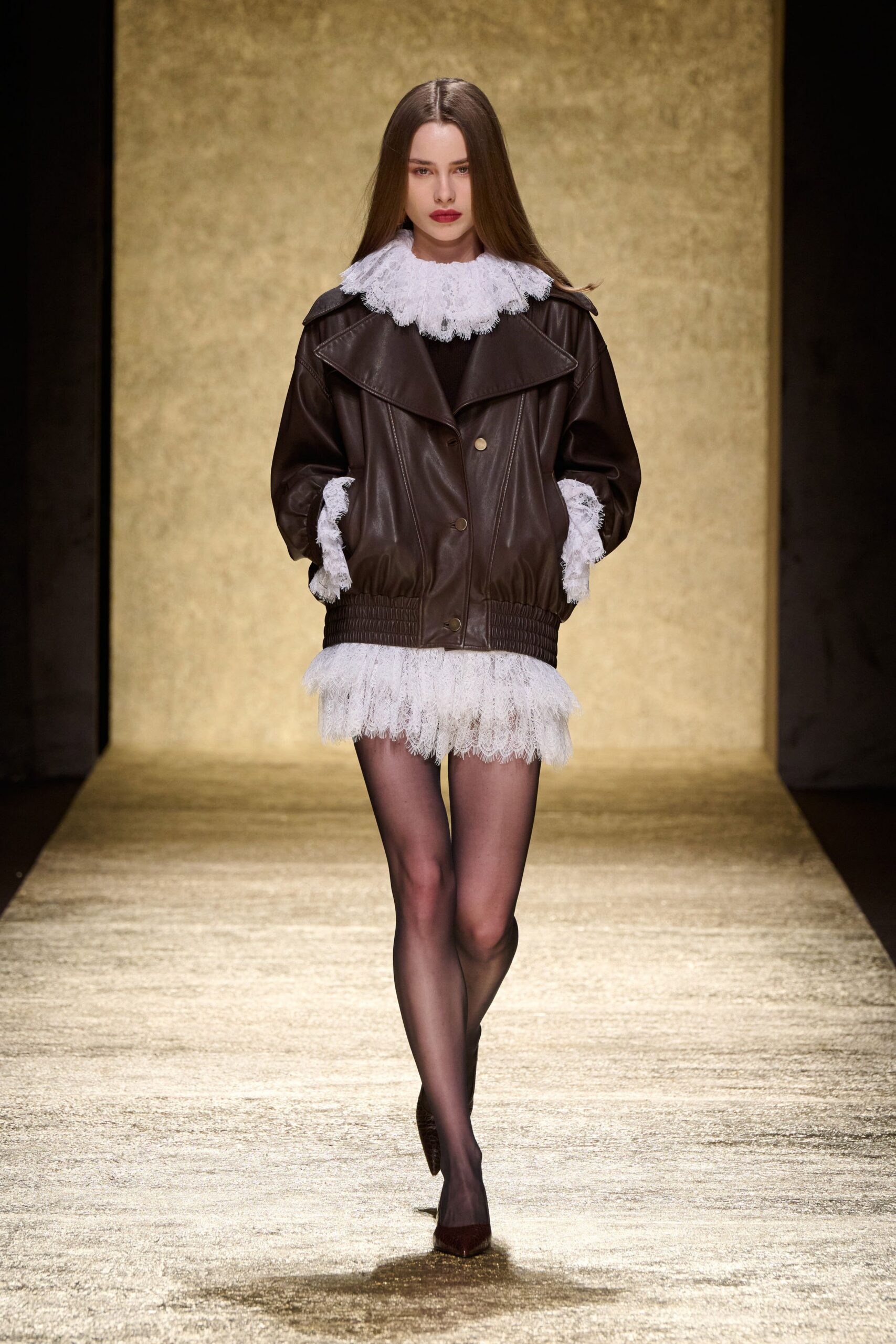 brown leather jacket with white lace dress