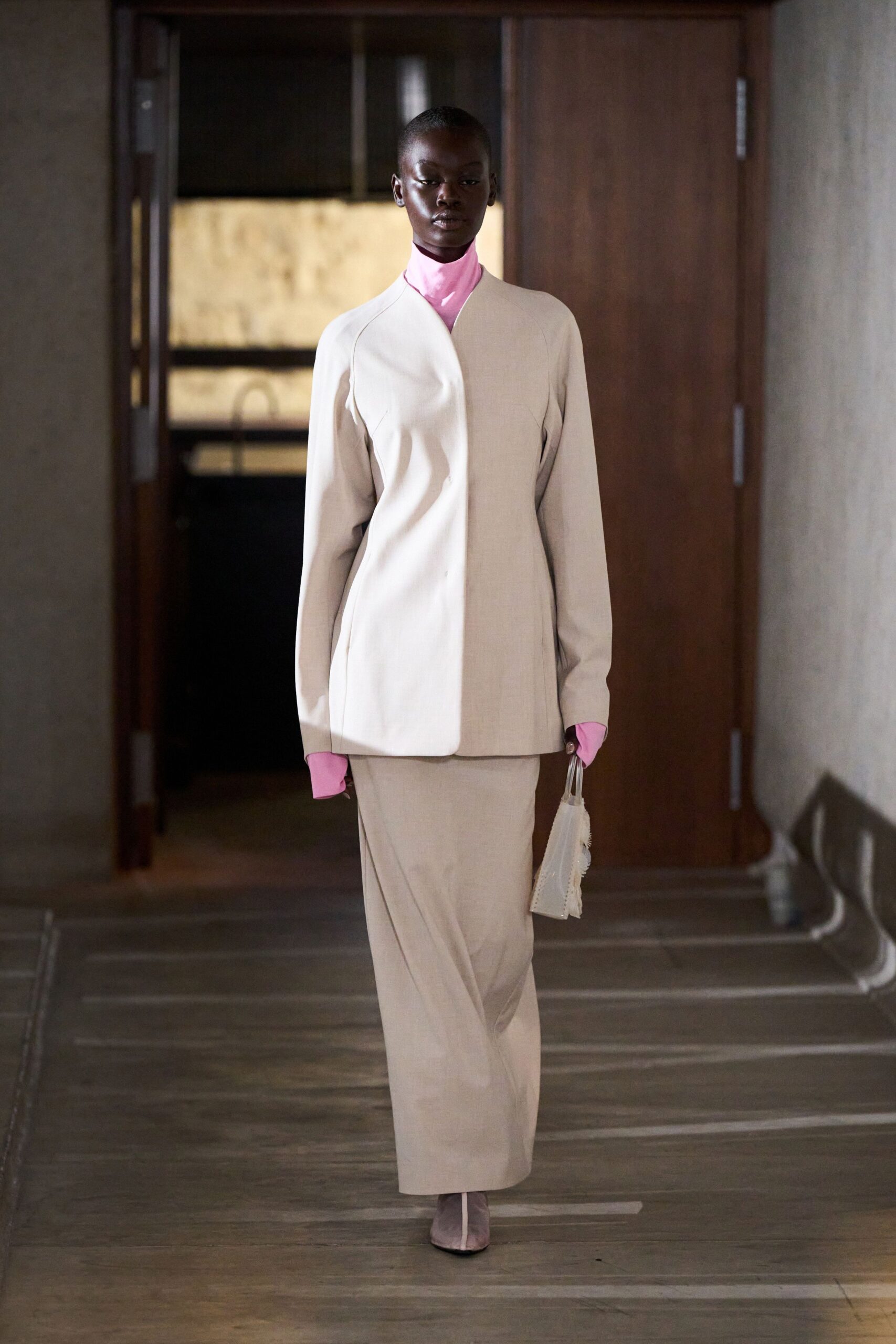 beige tailored blazer with pink top