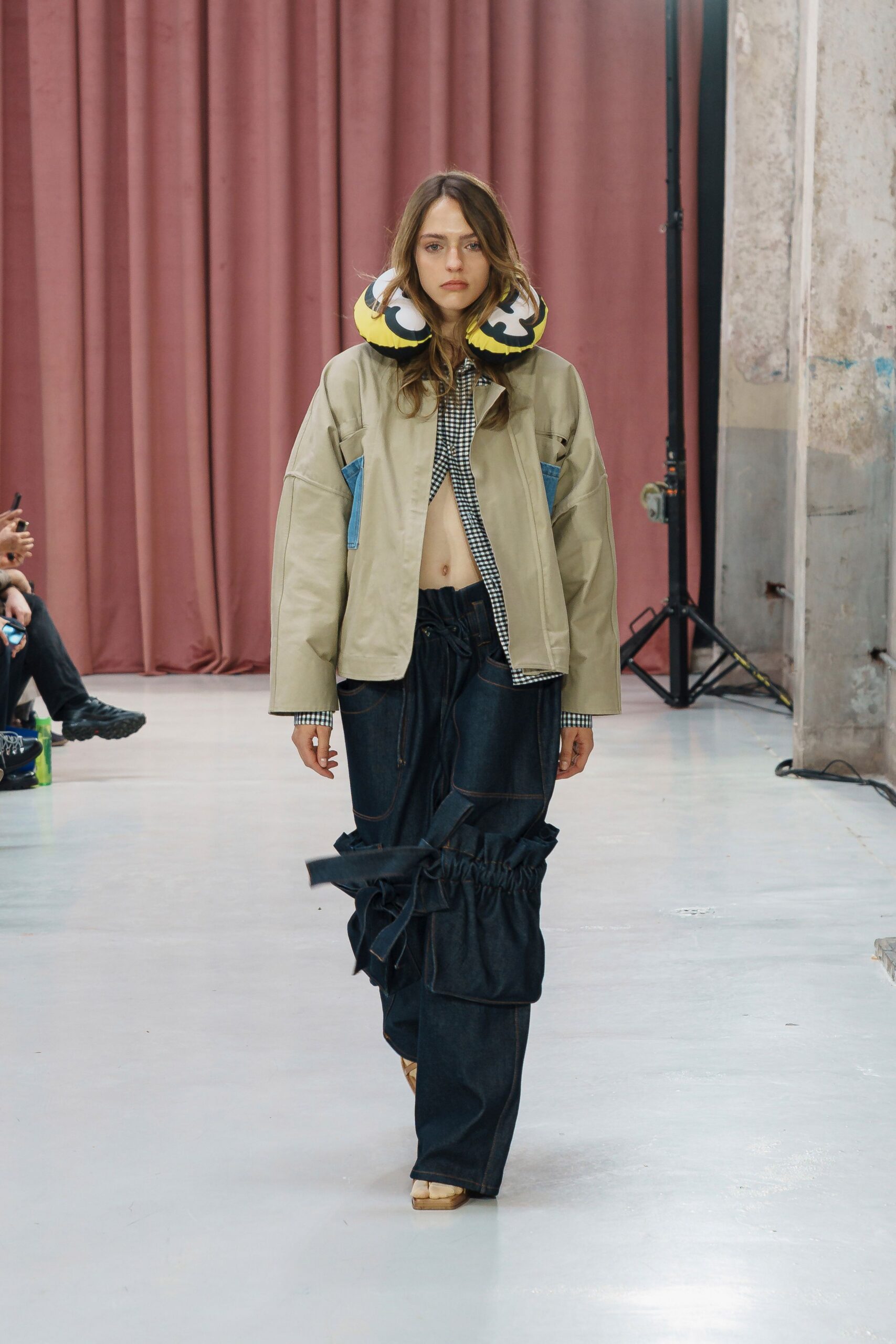 beige relaxed jacket and black pants