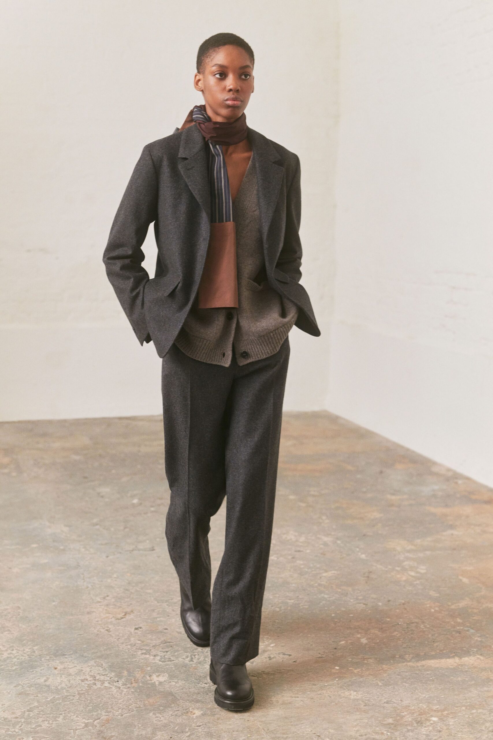black tailored blazer with gray vest